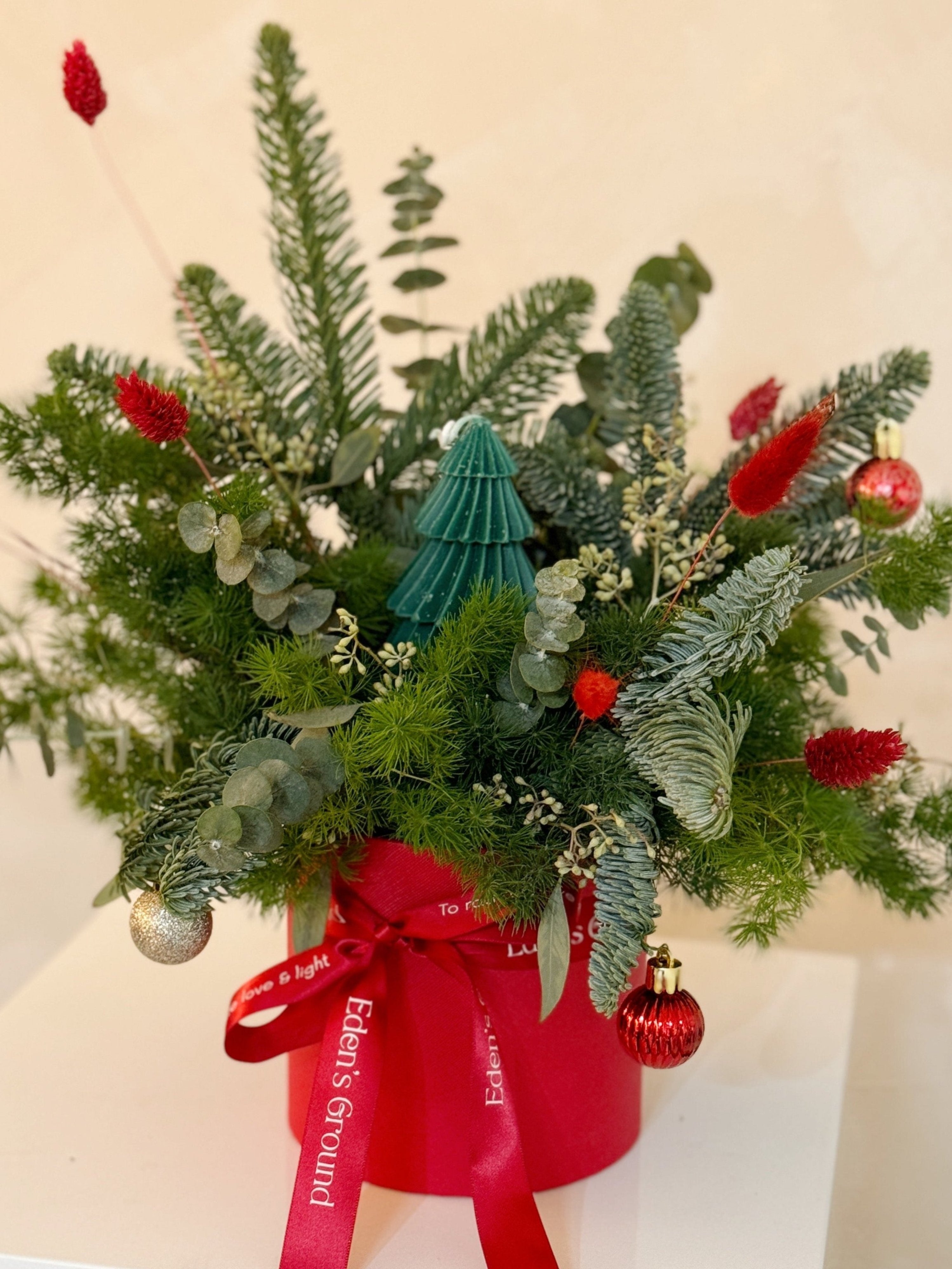 Christmas Tabletop cute mini candle Singapore by Eden's Ground Floral Design Florist SG Fresh Flowers and Foliage Preserved timeless eternal low maintenance Fun Creative Weekend Activity suitable for Couples Family and All Christmas Gifts Affordable things to do xmas celebration 2024 Best gifts to impress love ones home parties house party office decor corporate gifting Beautiful Fairy lights Kids and children will love Festive vibes Home decor mood winter wonderland Date night couple activities