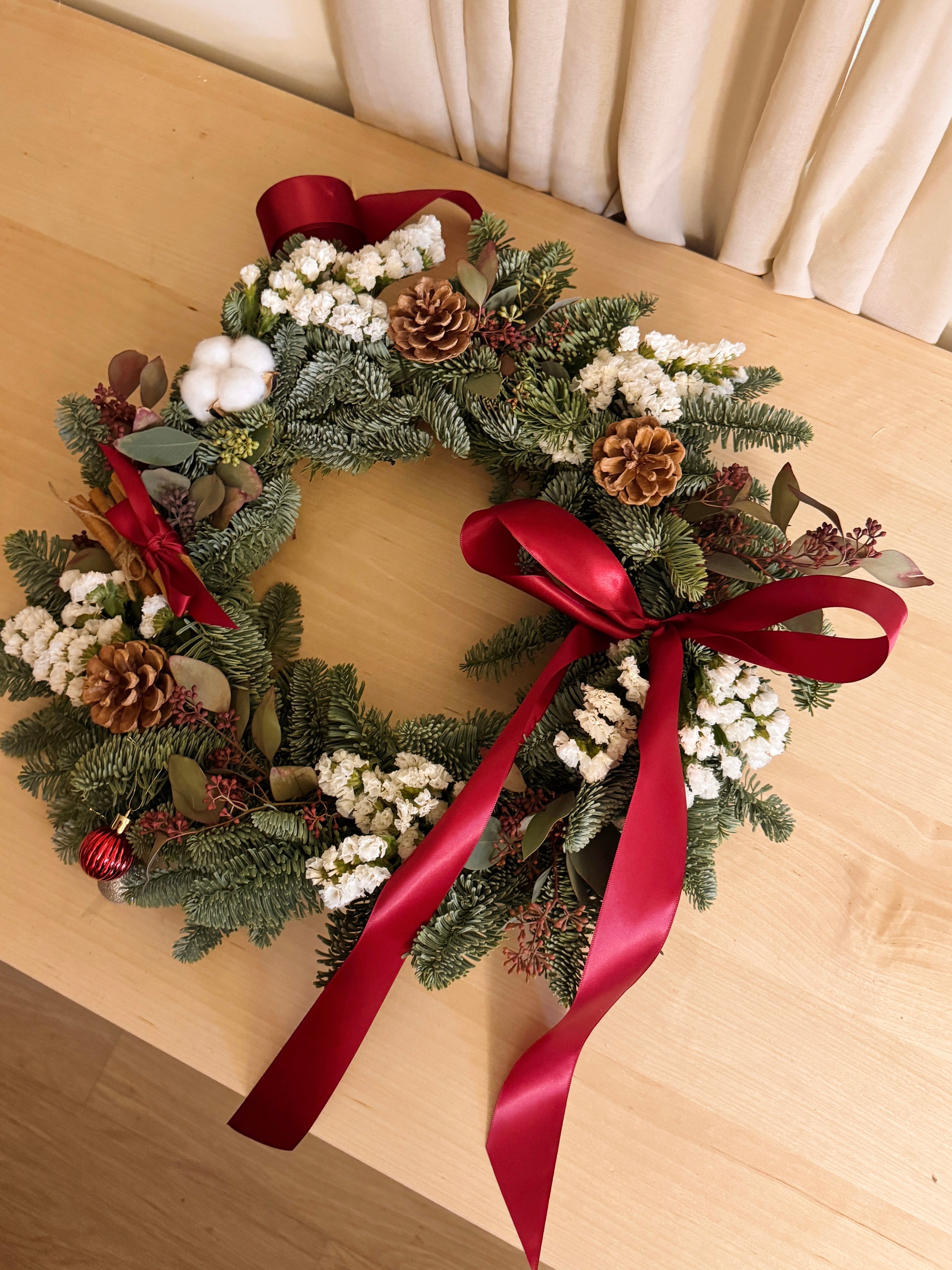 B2B Corporate Christmas gifting, workshop or festive floral bar options. Activity for team bonding for valued clients to celebrate Christmas in Singapore.