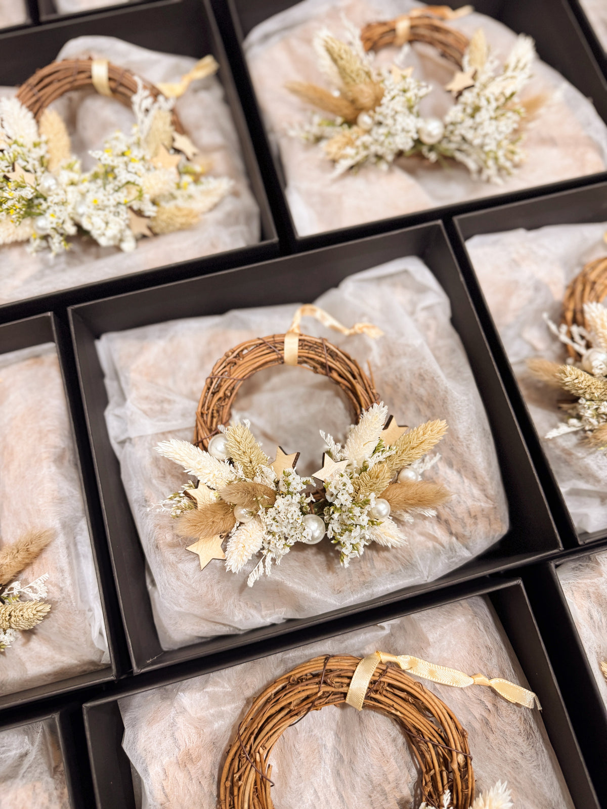 Mini Christmas Wreath decorated with pearls and stars for luxury brands in Singapore for festive gifting in Singapore, by Eden's Ground, a floral design studio.