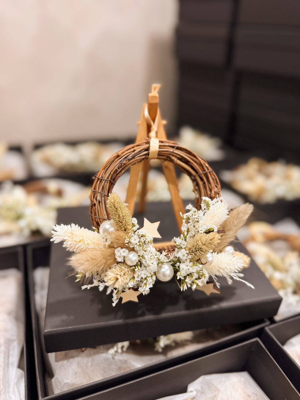 Mini Christmas Wreath decorated with pearls and stars for luxury brands in Singapore for festive gifting in Singapore, by Eden's Ground, a floral design studio.