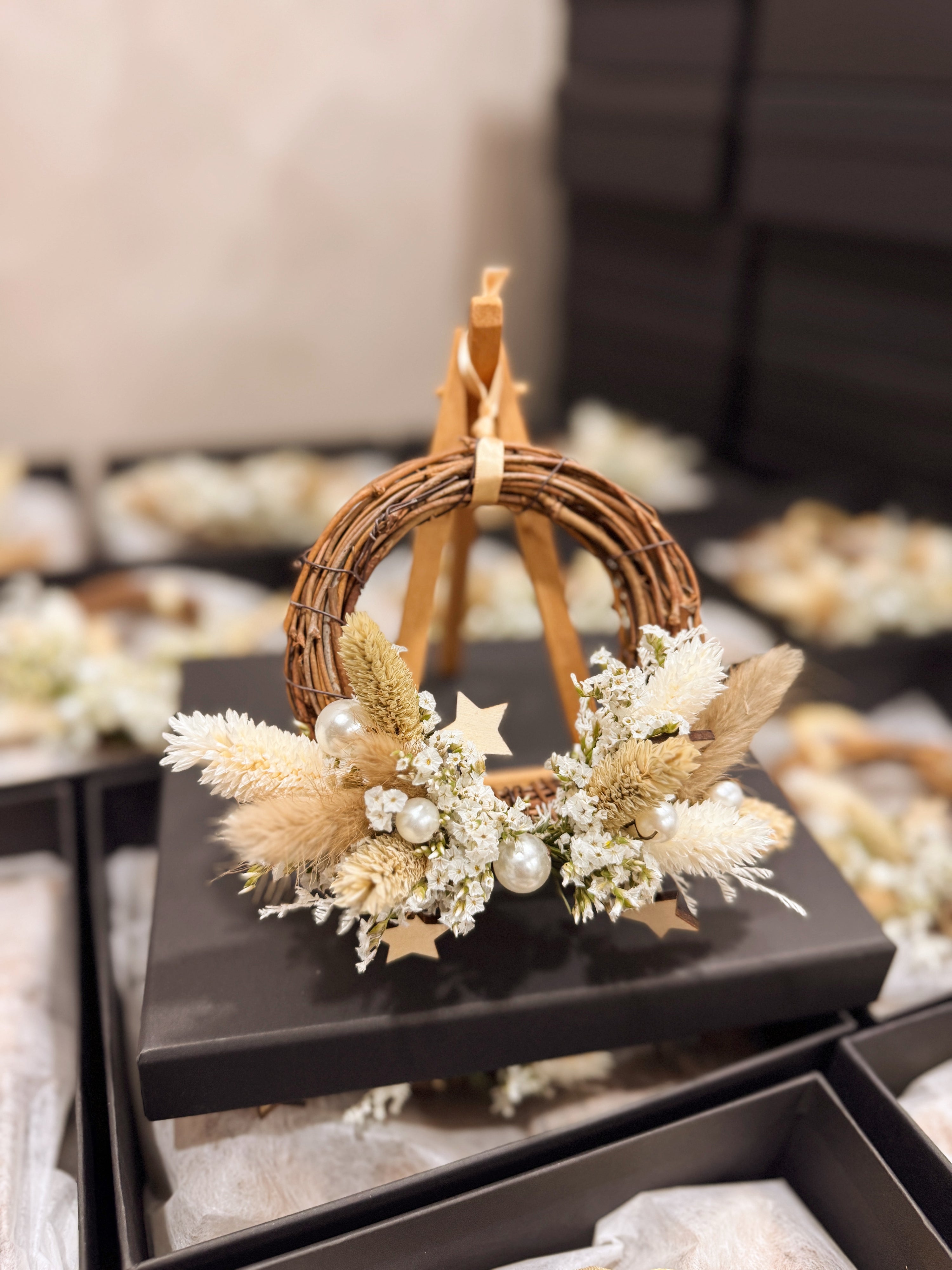 Mini Christmas Wreath decorated with pearls and stars for luxury brand like Chanel and Dior in Singapore for festive gifting in Singapore, by Eden's Ground, a floral design studio.