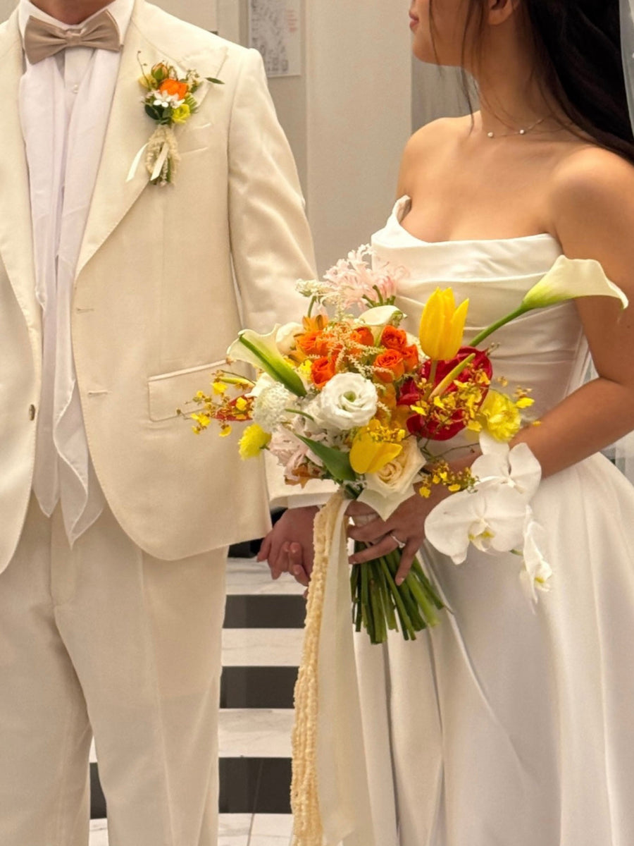 Custom Bridal Bouquet made with fresh Tulips and Roses crafted by Eden's Ground.