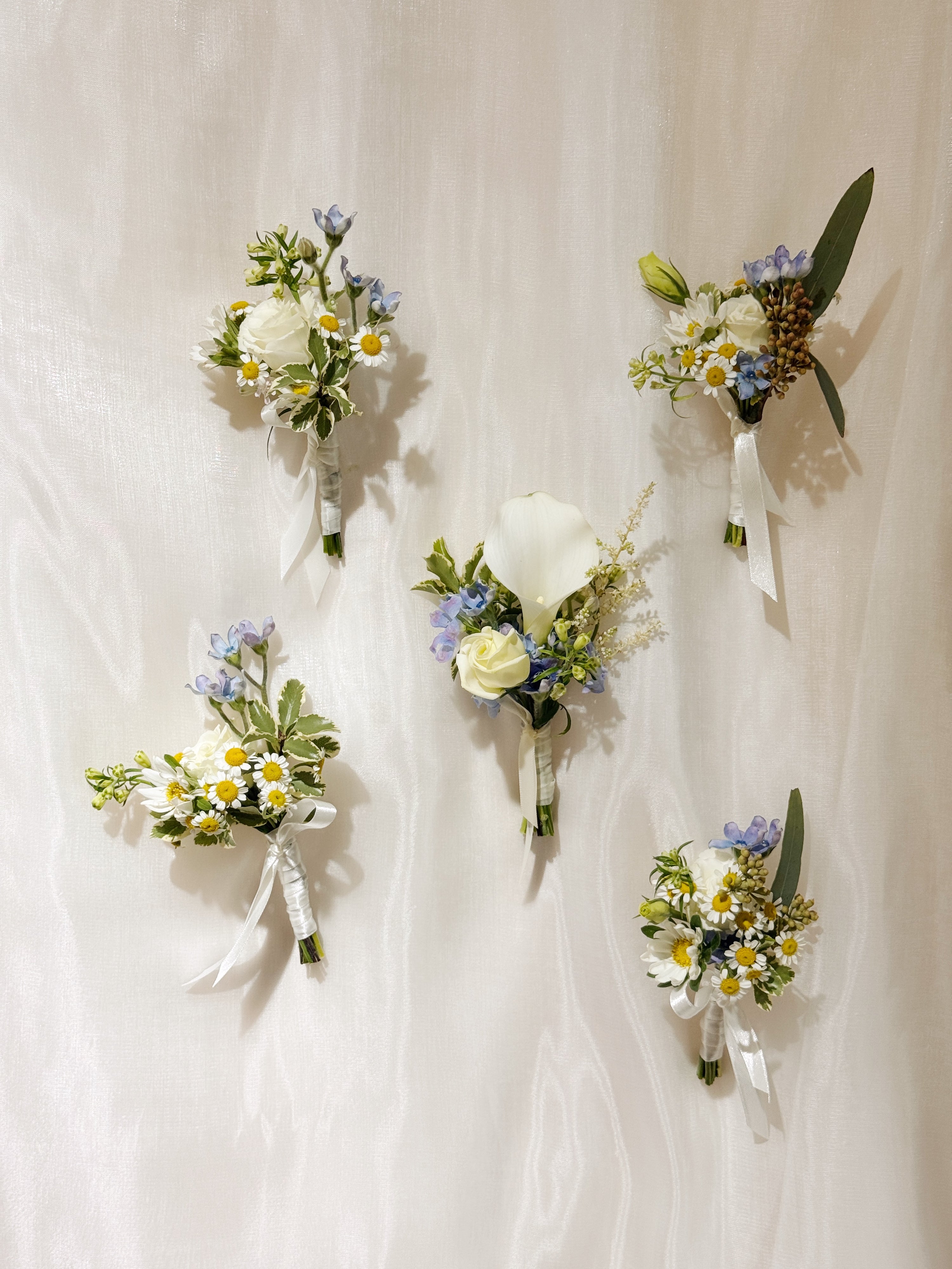 Groom's boutonnière or VIP (parents) and groomsmen flowers and corsages, customised for your wedding event, crafted by Eden's Ground.