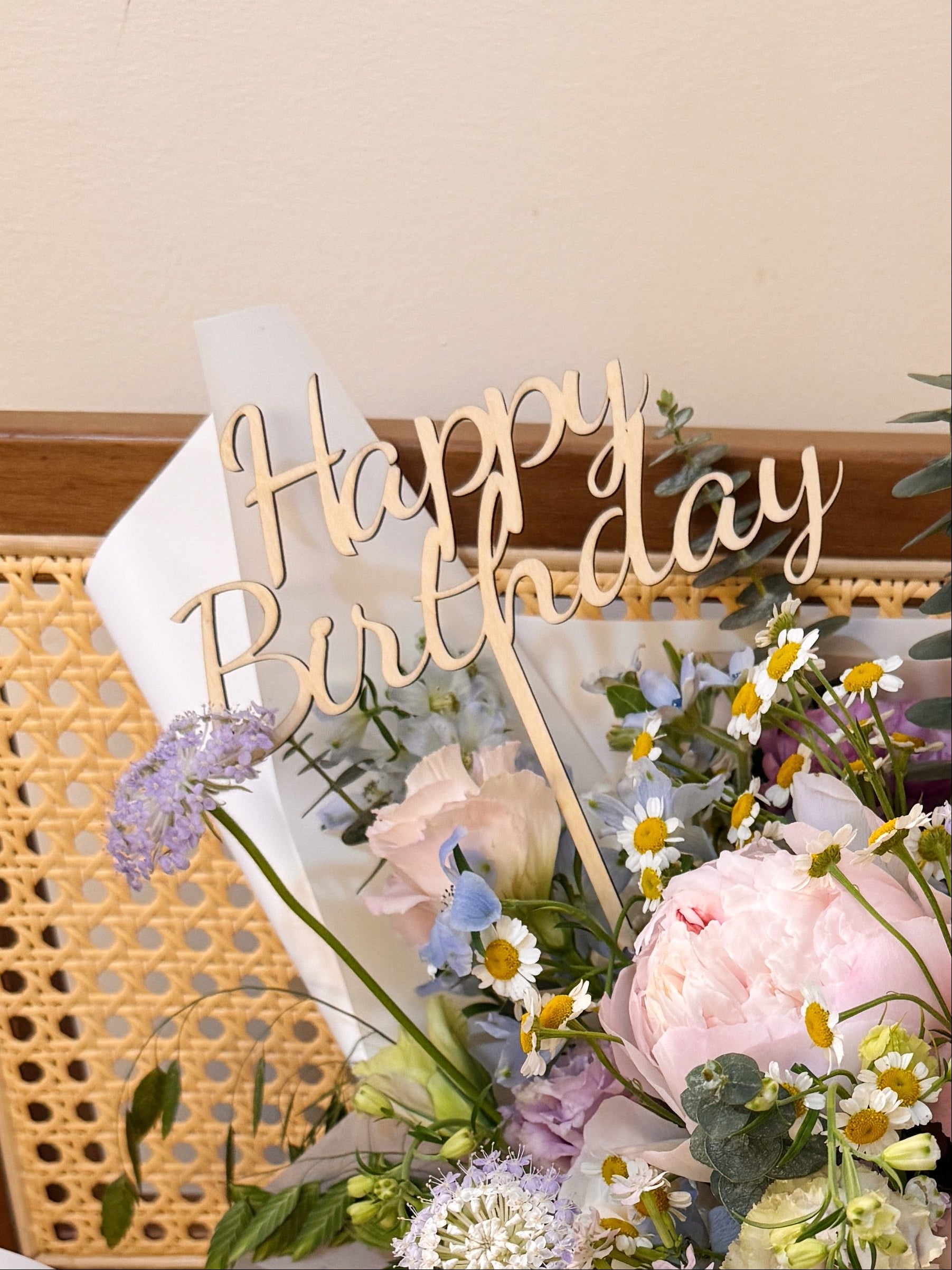 Happy Birthday wooden cake topper sign, crafted by Eden's Ground, a floral design studio in Singapore.