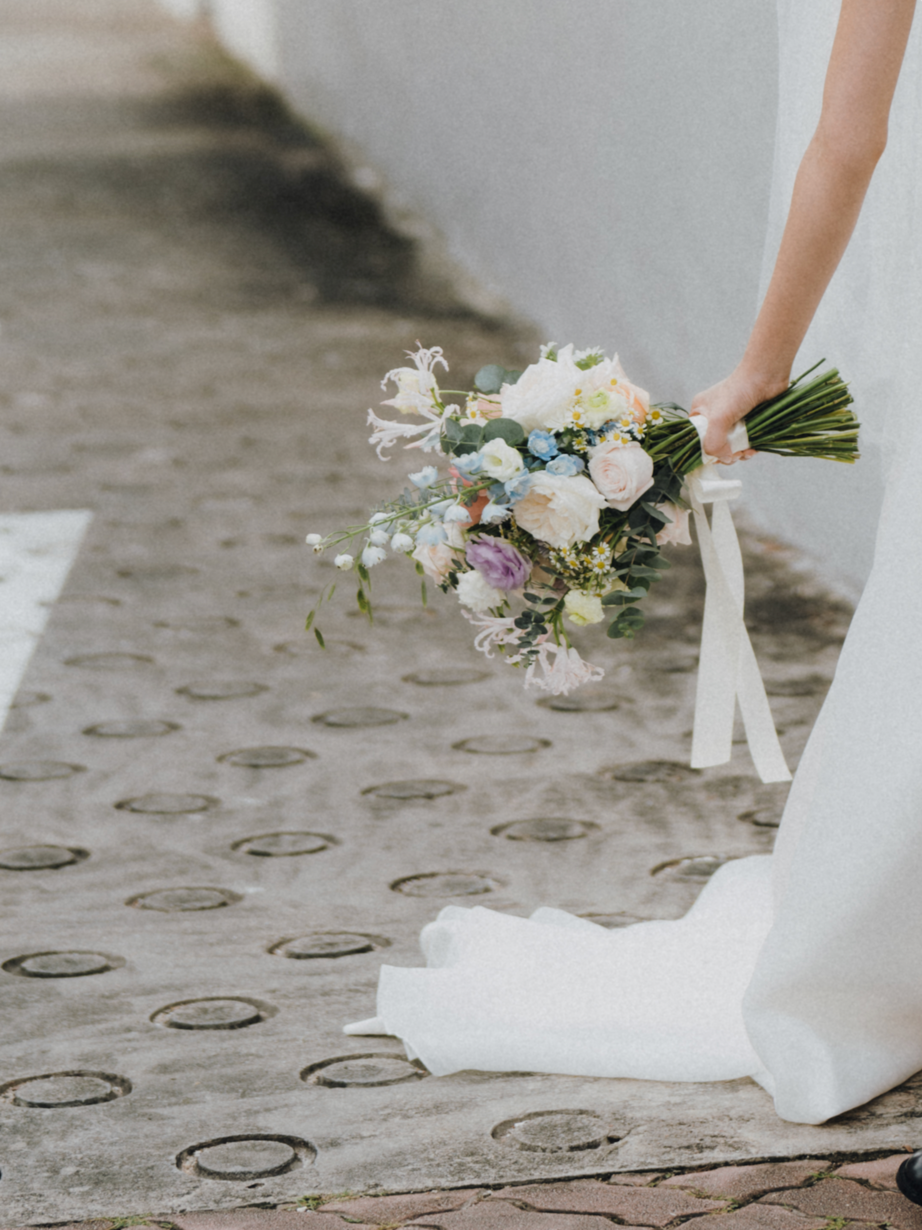 Custom Bridal Bouquet made with fresh Scented Roses, and bright garden flowers crafted by Eden's Ground.