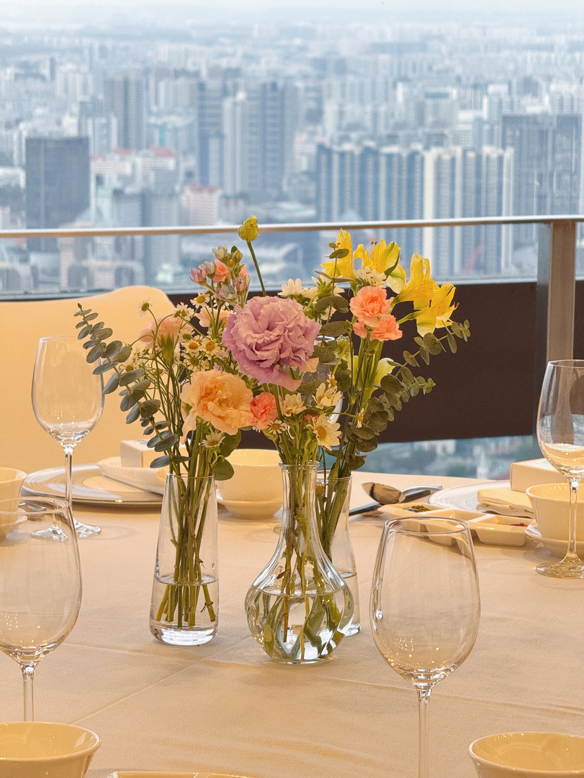 Bespoke Bud Vases Table Arrangements for wedding dinner and wedding luncheon, made thoughtfully to complement your wedding theme. Made by Eden's Ground, a floral design boutique in Singapore.