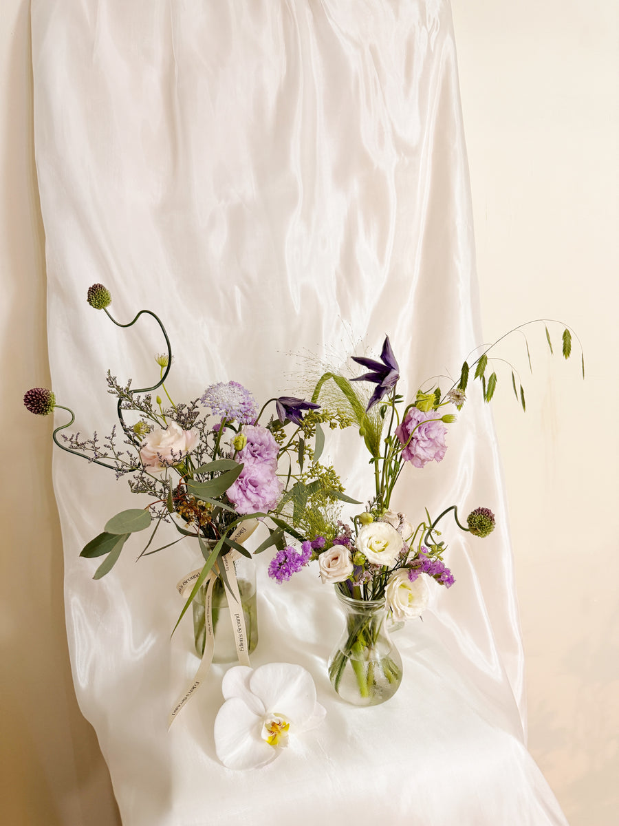 Bespoke Bud Vases Table Arrangements for wedding dinner and wedding luncheon, made thoughtfully to complement your wedding theme. Made by Eden's Ground, a floral design boutique in Singapore.