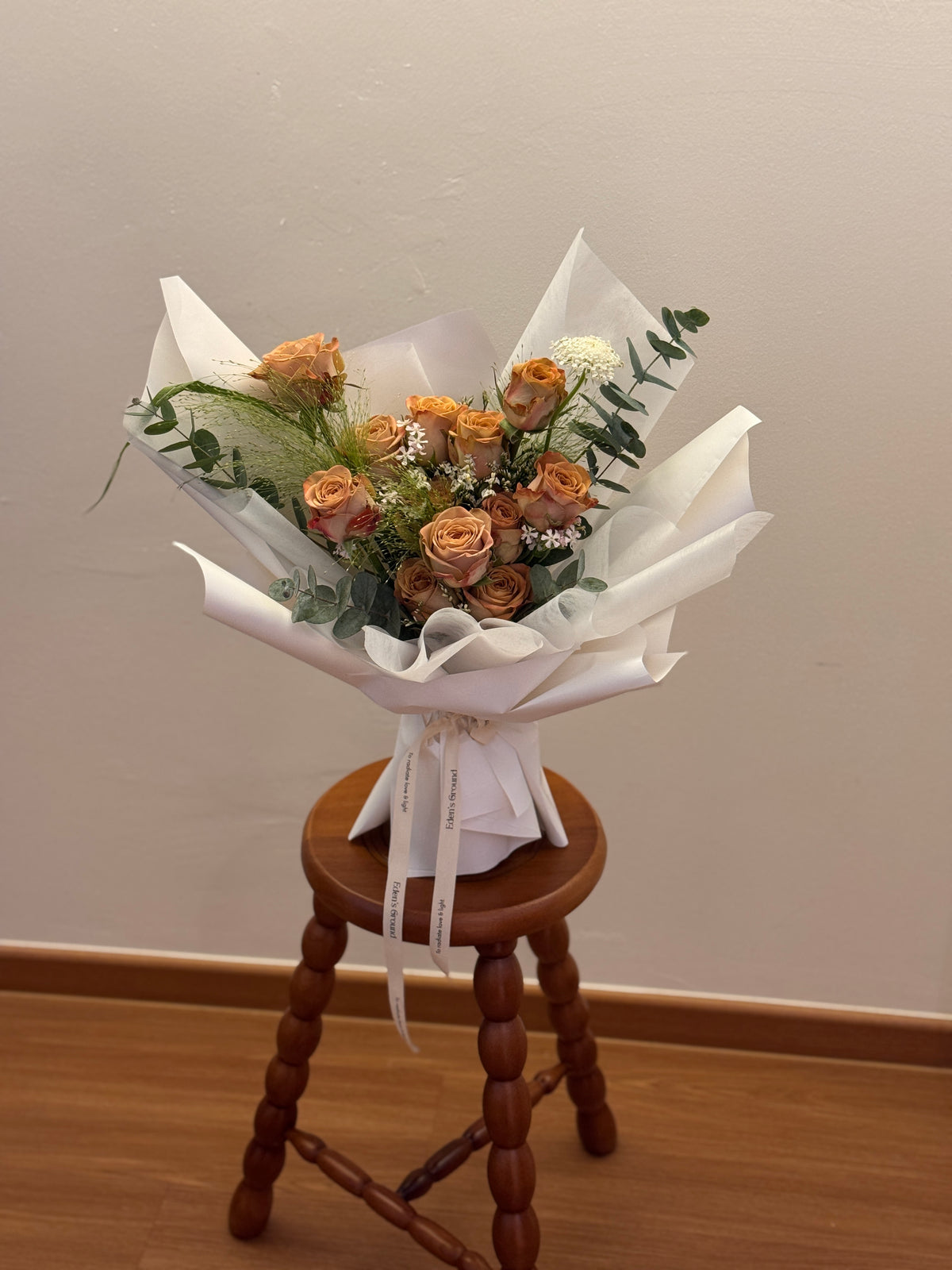 Ombre mocha like cappuccino roses bouquet wrapped in white tissue paper and white korean glassine paper crafted by Eden’s Ground. Perfect for Valentine's day for expressing appreciation, loyalty and a quiet, confident kind of romance.