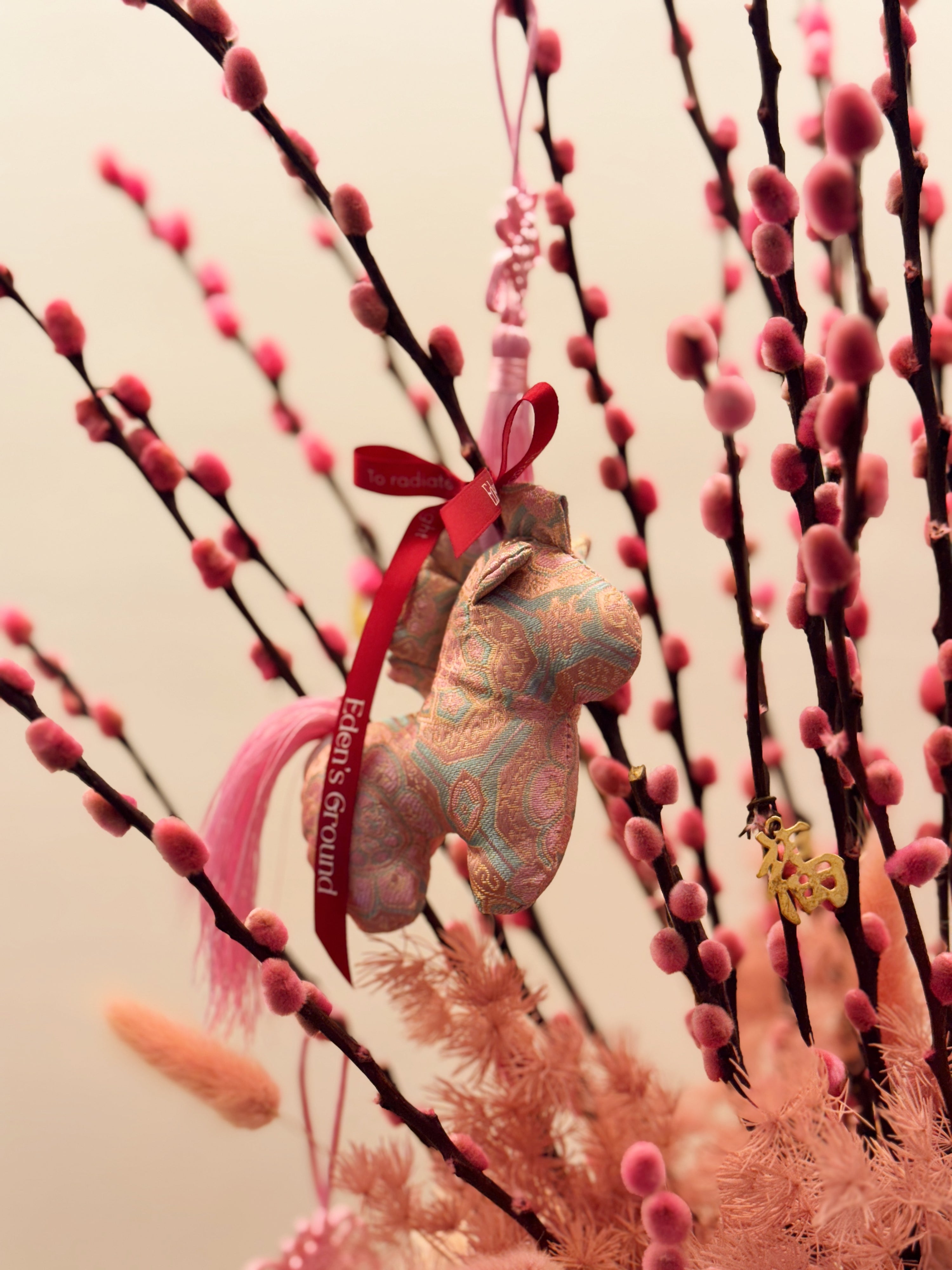 Chinese New Year 2026 Pussy Willow Flower Box, featuring pink and gold pussy willow cny flower, everlasting preserved hydrangeas, decorated with pink tassles and 福 to usher in wealth, abundance, prosperity and all the good vibes for the lunar new year, crafted by Eden's Ground, a floral design studio in Singapore. Delivered straight to your doorstep.