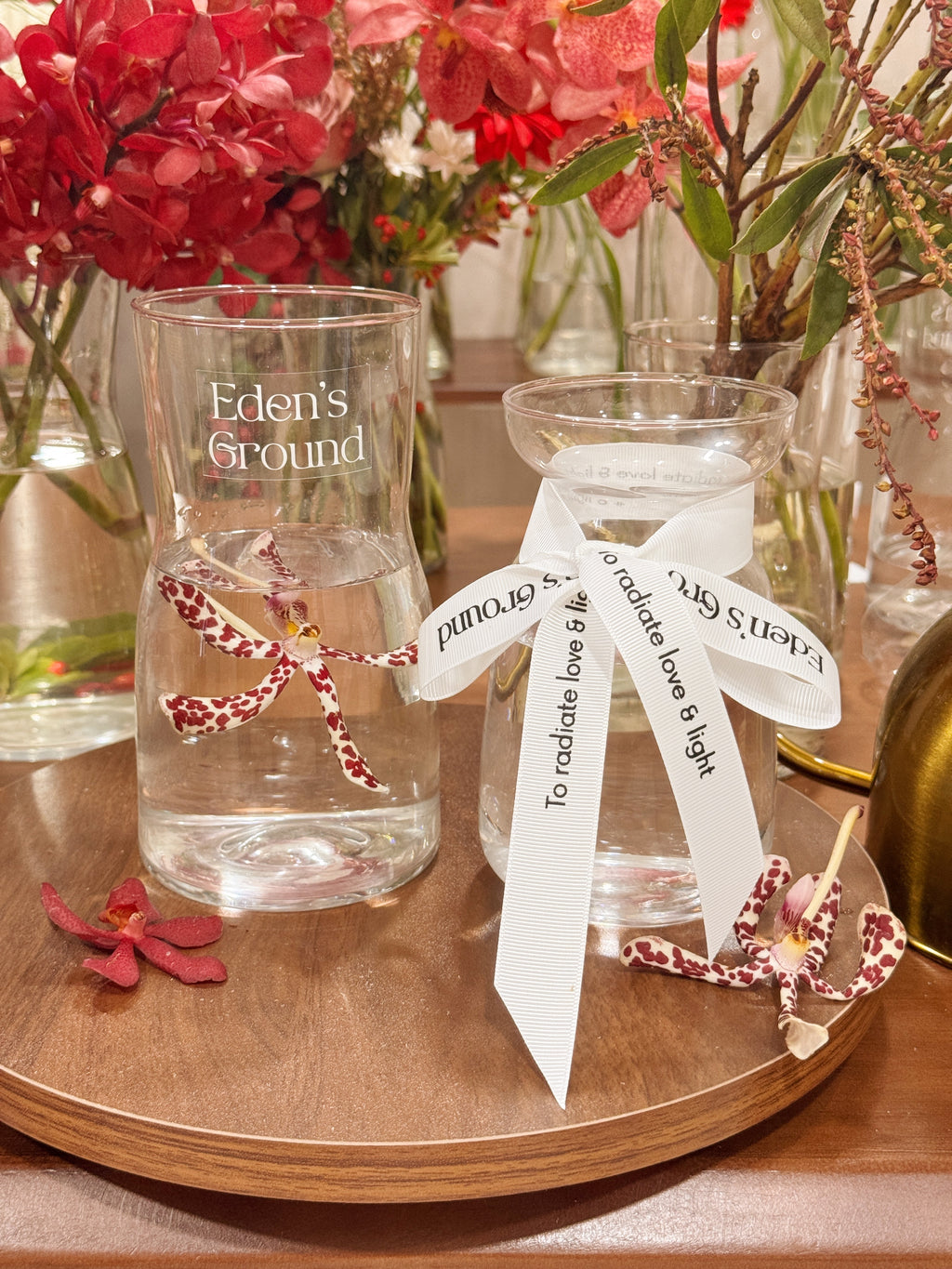 Clear glass vase, suitable for flower vase arrangements. Available at Eden's Ground, a floral design boutique.