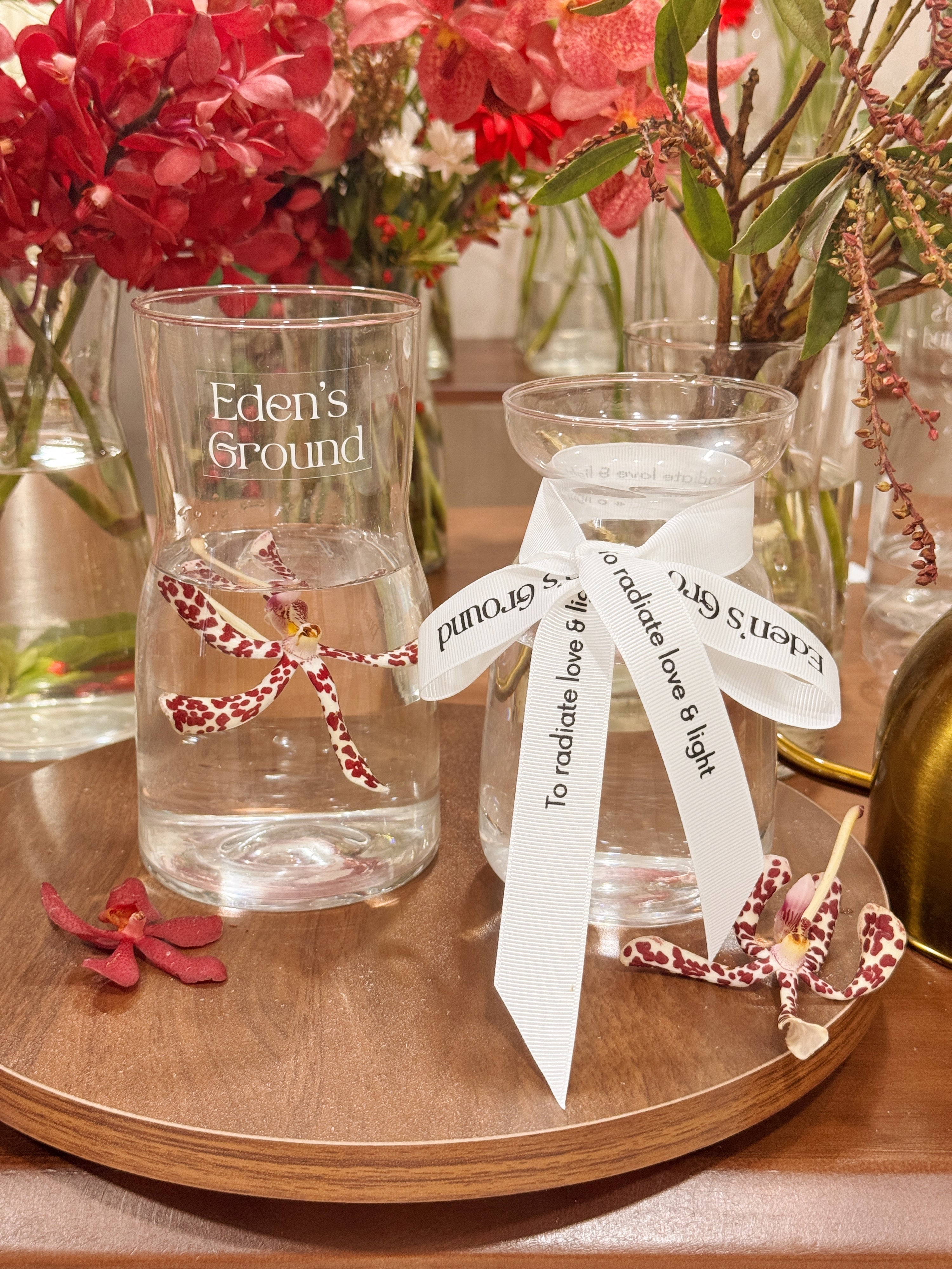 Clear glass vase, suitable for flower vase arrangements. Available at Eden's Ground, a floral design boutique.