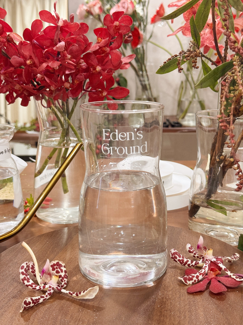 Clear glass vase, suitable for flower vase arrangements. Available at Eden's Ground, a floral design boutique.