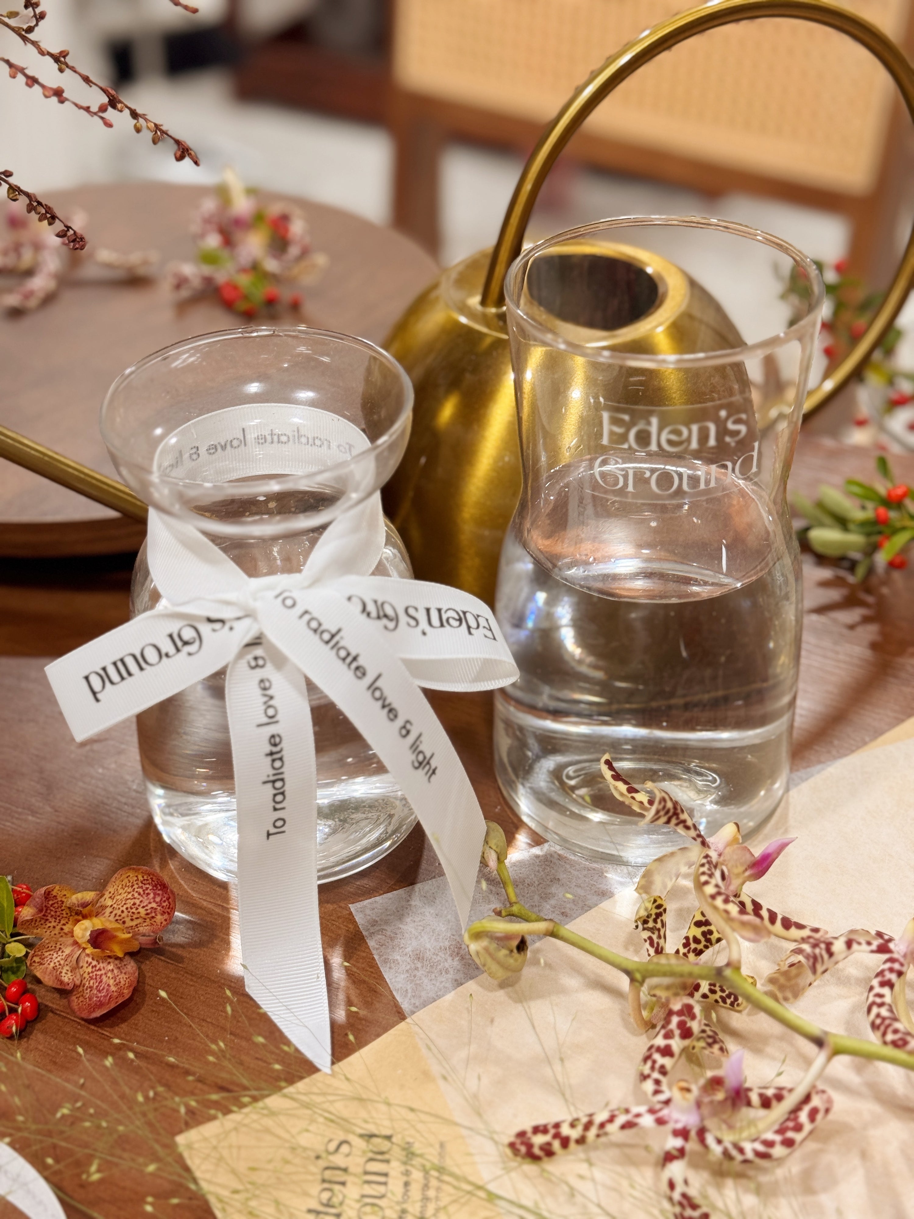 Clear glass vase, suitable for flower vase arrangements. Available at Eden's Ground, a floral design boutique.