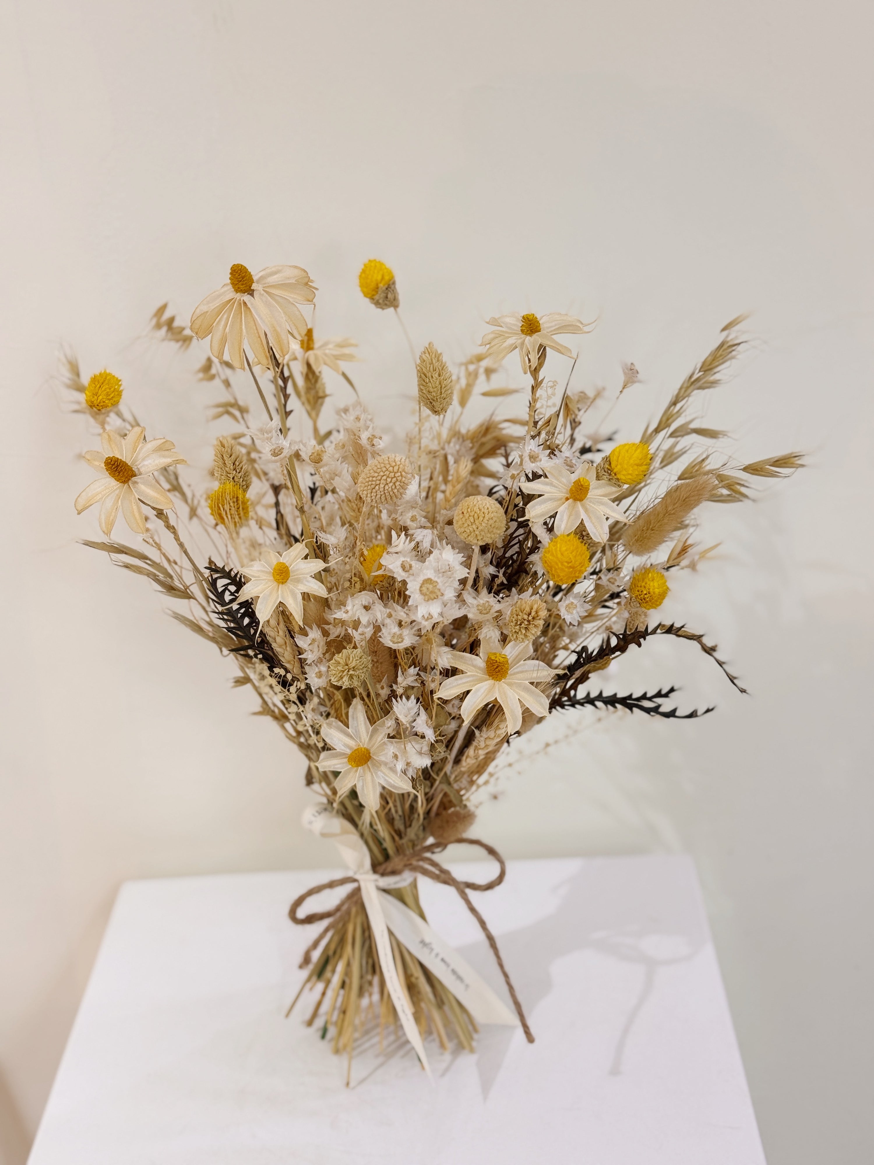 Custom Bridal Bouquet made with preserved and dried daisy flowers crafted by Eden's Ground.