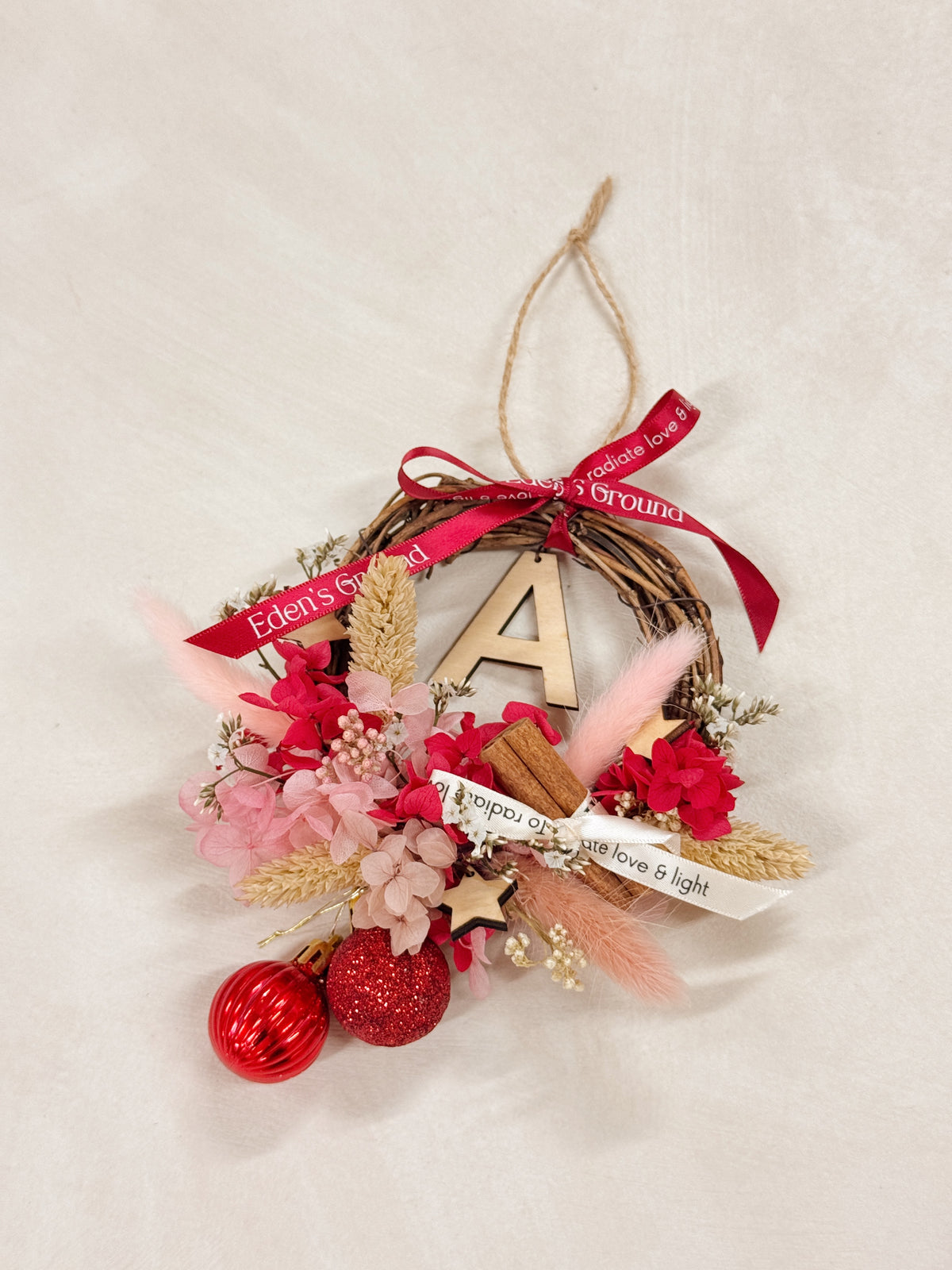 Preserved and Dried DIY Kit Christmas Wreath, decorated with baubles, ornaments, cinnamon sticks, hydrangeas and more by Eden's Ground, a Floral Design Studio in Singapore.