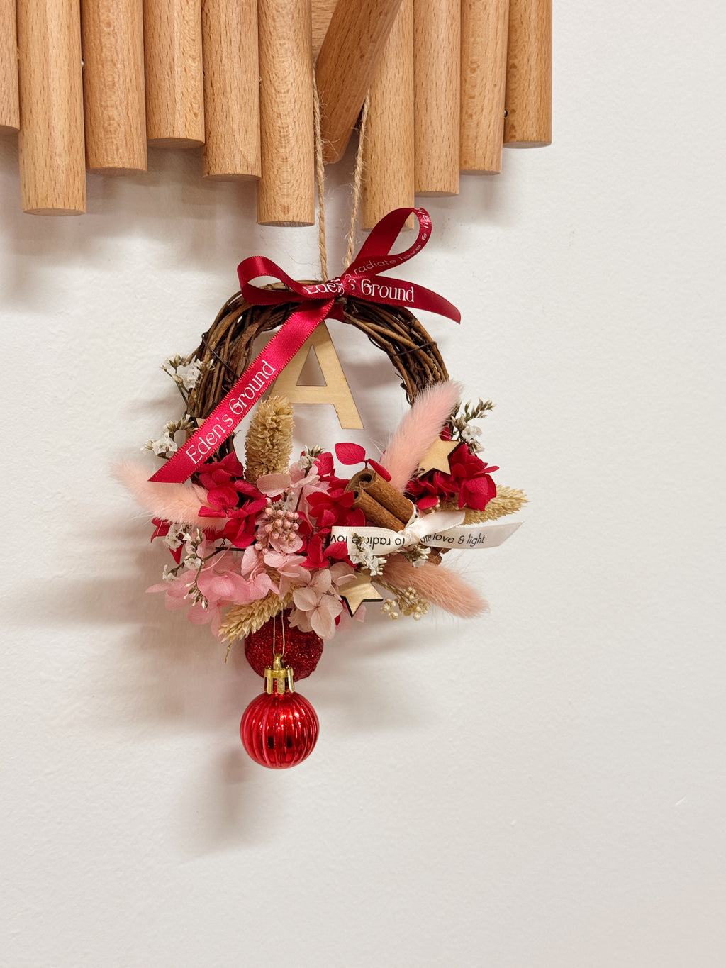 Preserved and Dried DIY Kit Christmas Wreath, decorated with baubles, ornaments, cinnamon sticks, hydrangeas and more by Eden's Ground, a Floral Design Studio in Singapore.