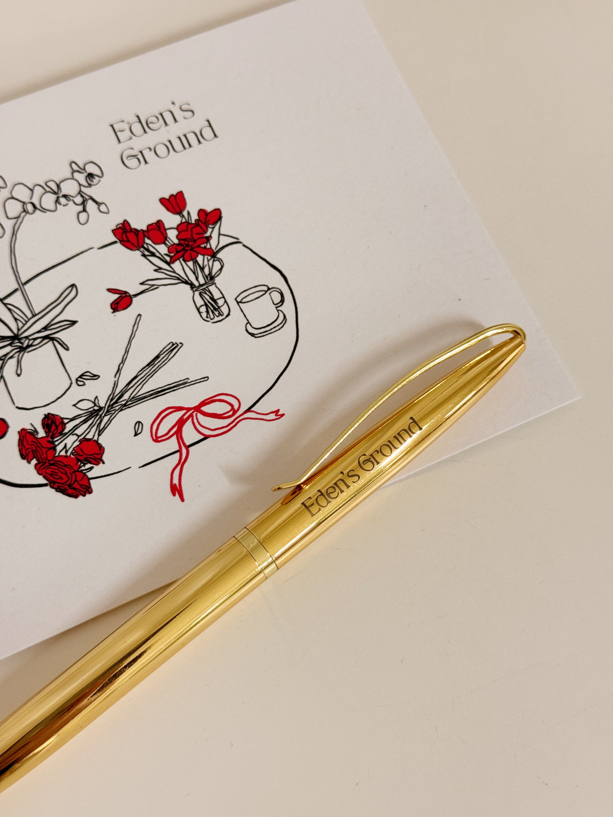 An elegant gold ballpoint pen with a smooth writing flow.