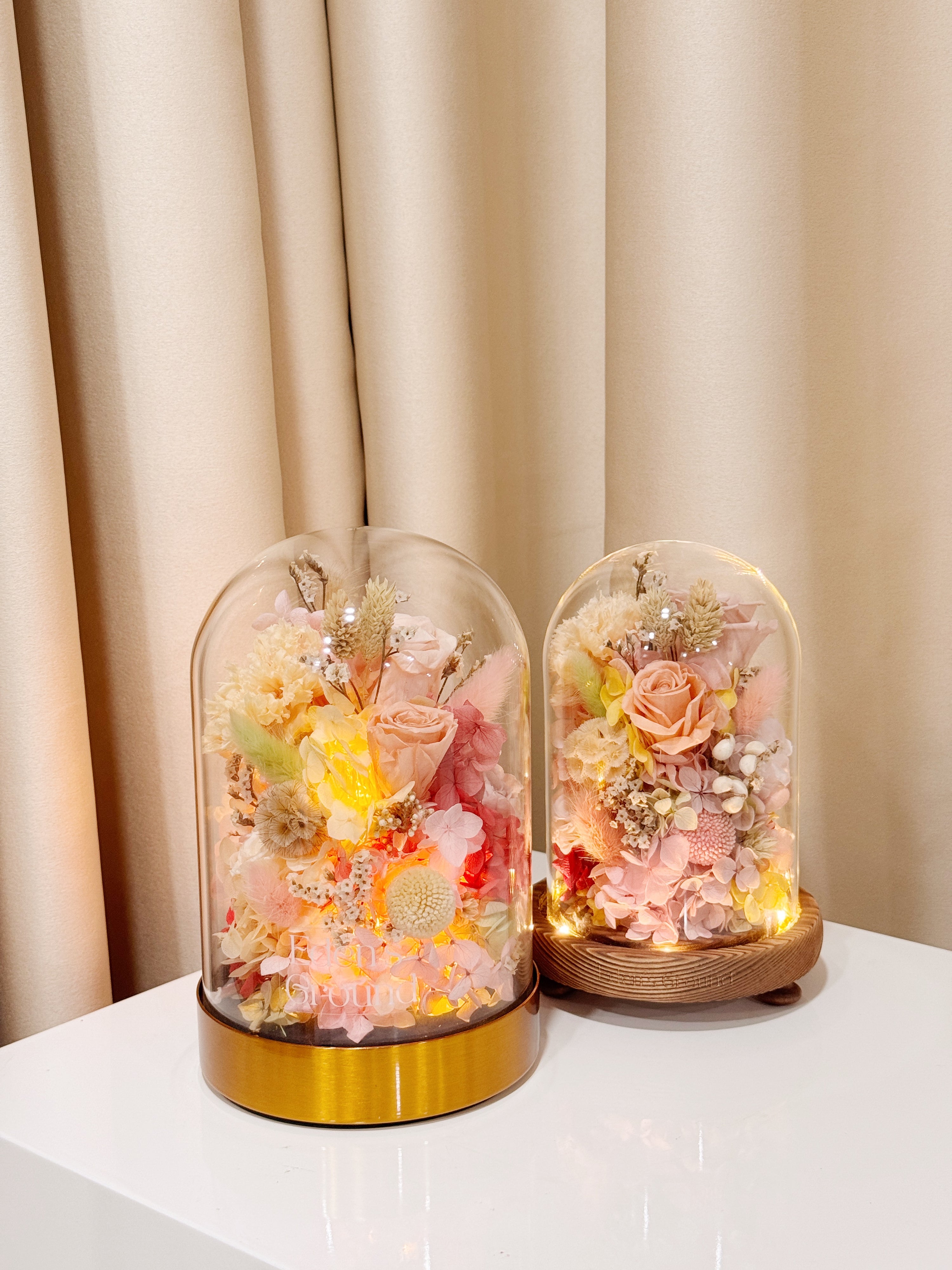 Ethereal Embrace Flower Dome is made with a delicate blend of preserved and dried flowers in a variety of vibrant colours, beautifully arranged in a glass dome by Eden’s Ground—an unforgettable gift or home decor made to last.