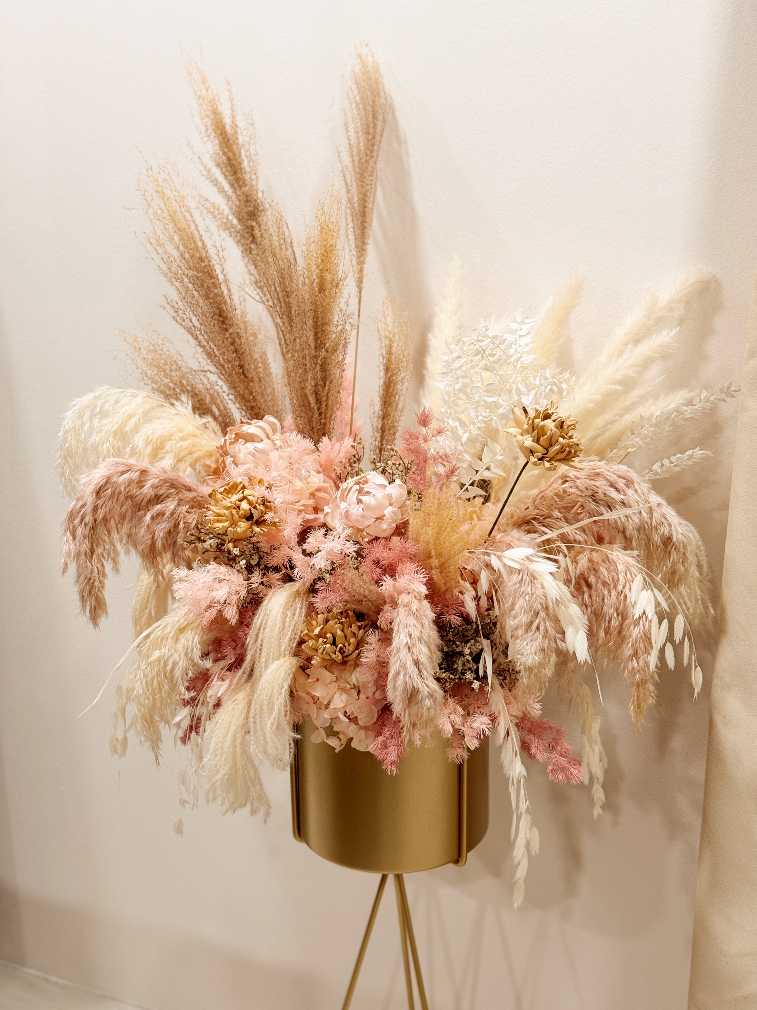 Celebrate achievements and milestones with our Everlasting Congratulatory Flower Stand, filled with long-lasting flowers to convey prosperity, joy, and success. Crafted by Eden's Ground, a floral design boutique.