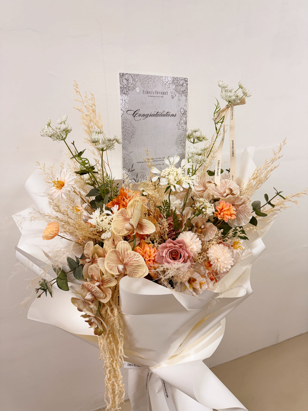 Everlasting Flowers Congratulatory Stand, featuring longlasting fau preserved and dried flowers, crafted by Eden's Ground, a floral design boutique based in Singapore.