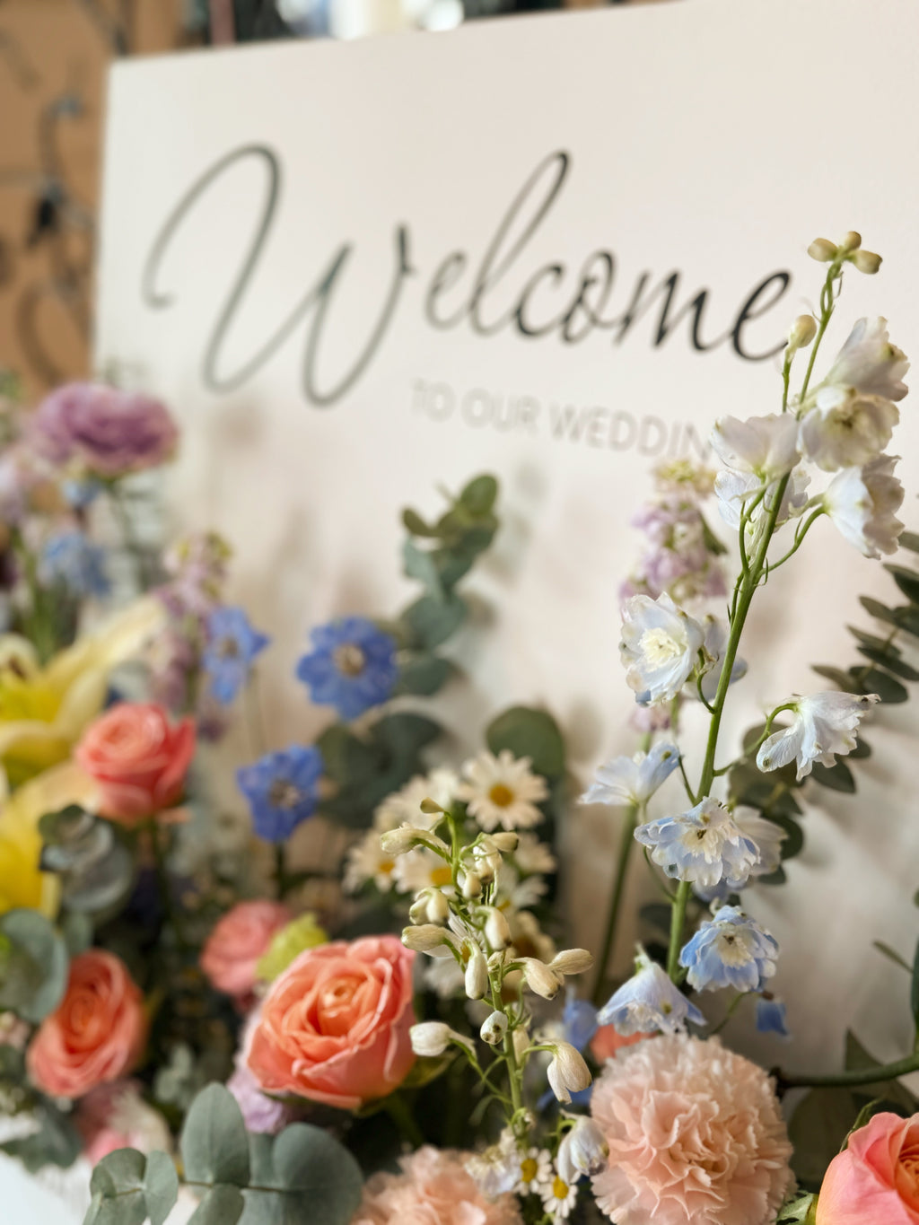 Elegant customisable welcome sign with flower box to welcome guests entering your wedding or birthday party venue in Singapore, rental by Eden's Ground.