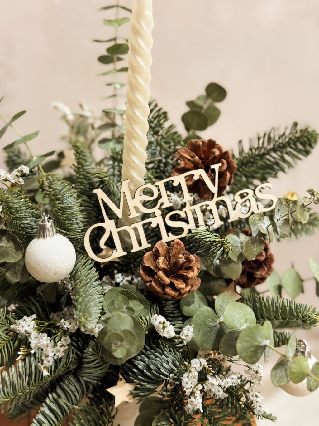 Fresh Christmas Bloom Box, decorated with stars and baubles for setting the dinner table and mood. By Eden's Ground, a Floral Design Studio in Singapore.