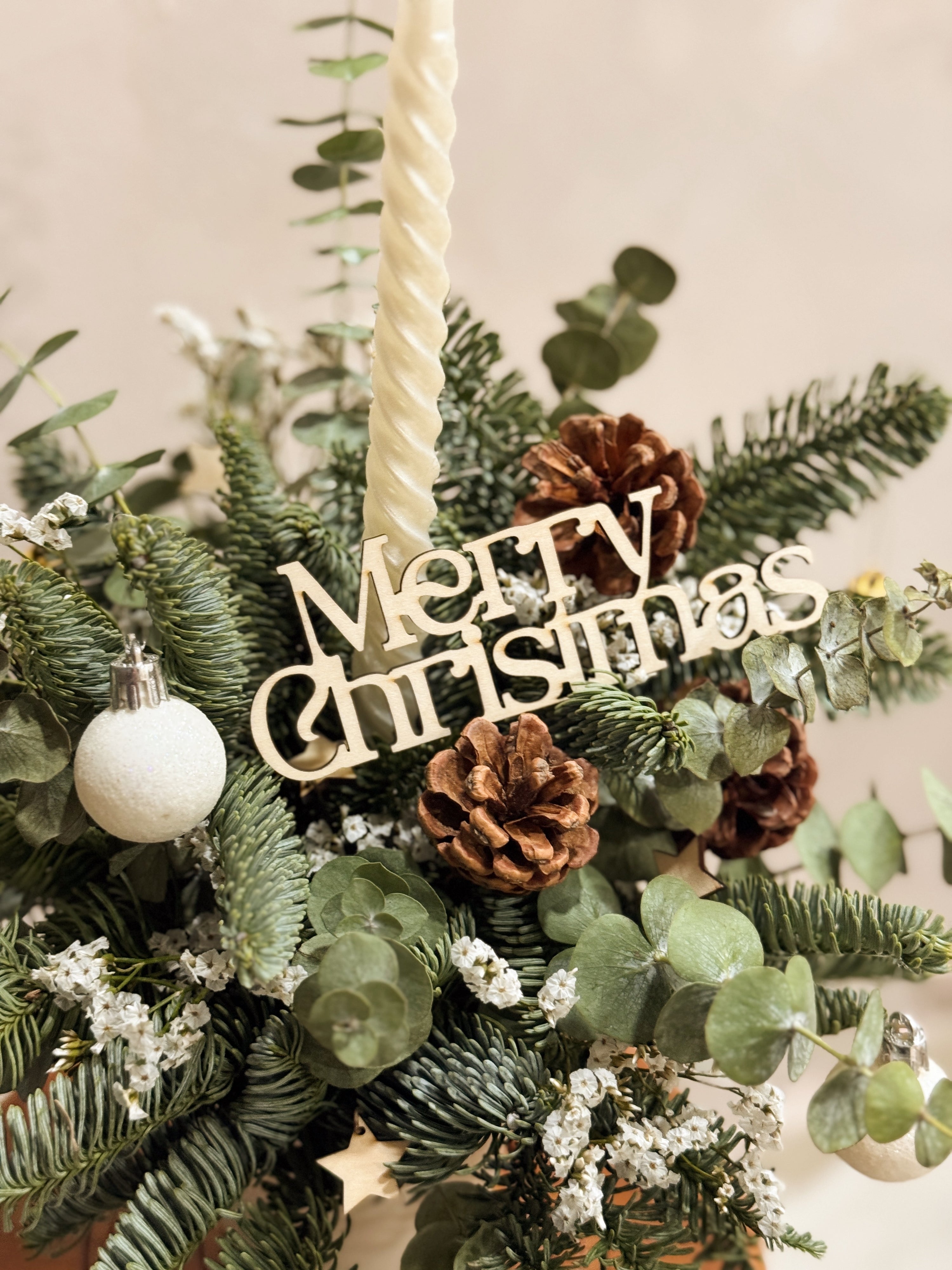 Fresh Christmas Bloom Box, decorated with stars and baubles for setting the dinner table and mood. By Eden's Ground, a Floral Design Studio in Singapore.