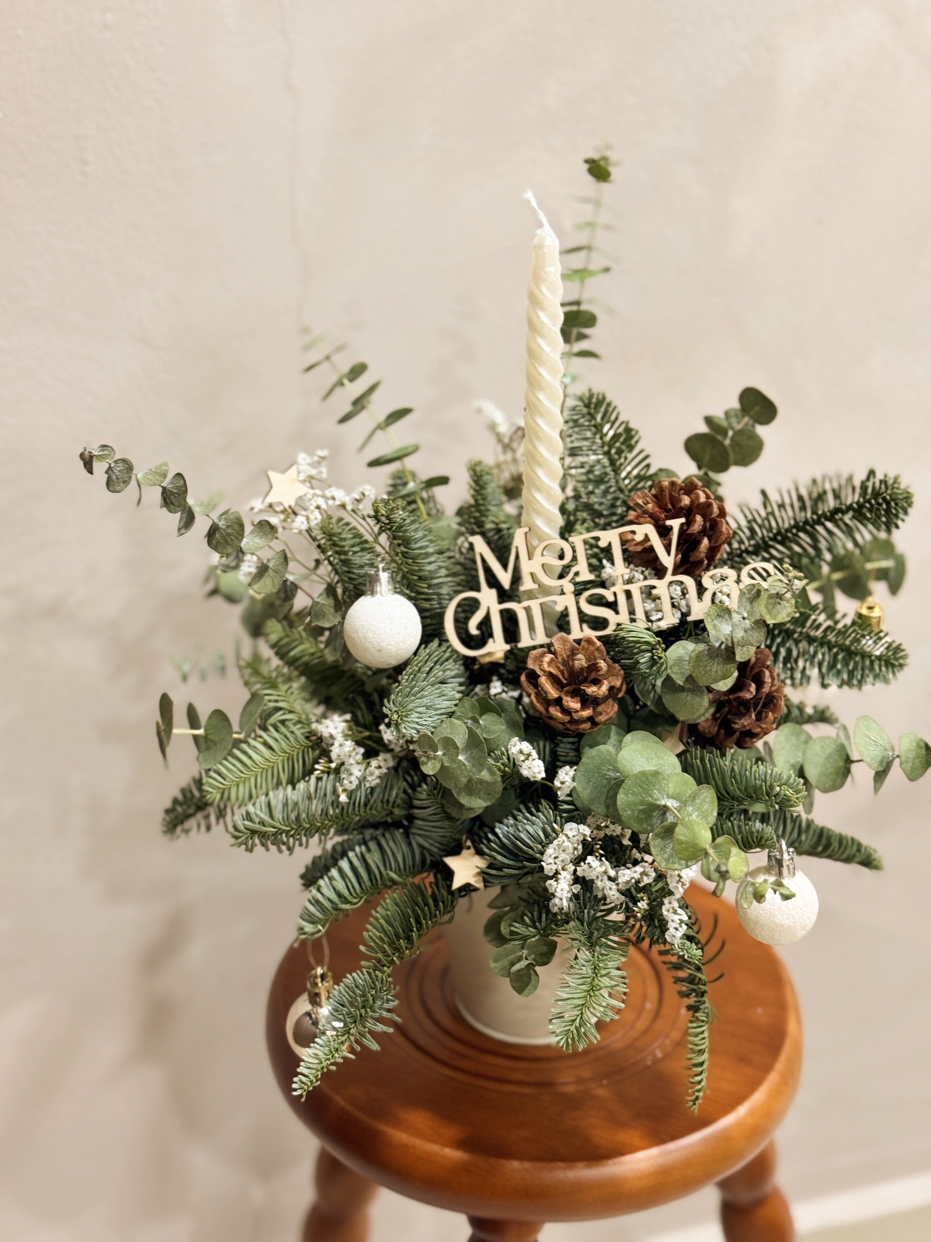 Fresh Christmas Bloom Box, decorated with stars and baubles for setting the dinner table and mood. By Eden's Ground, a Floral Design Studio in Singapore.