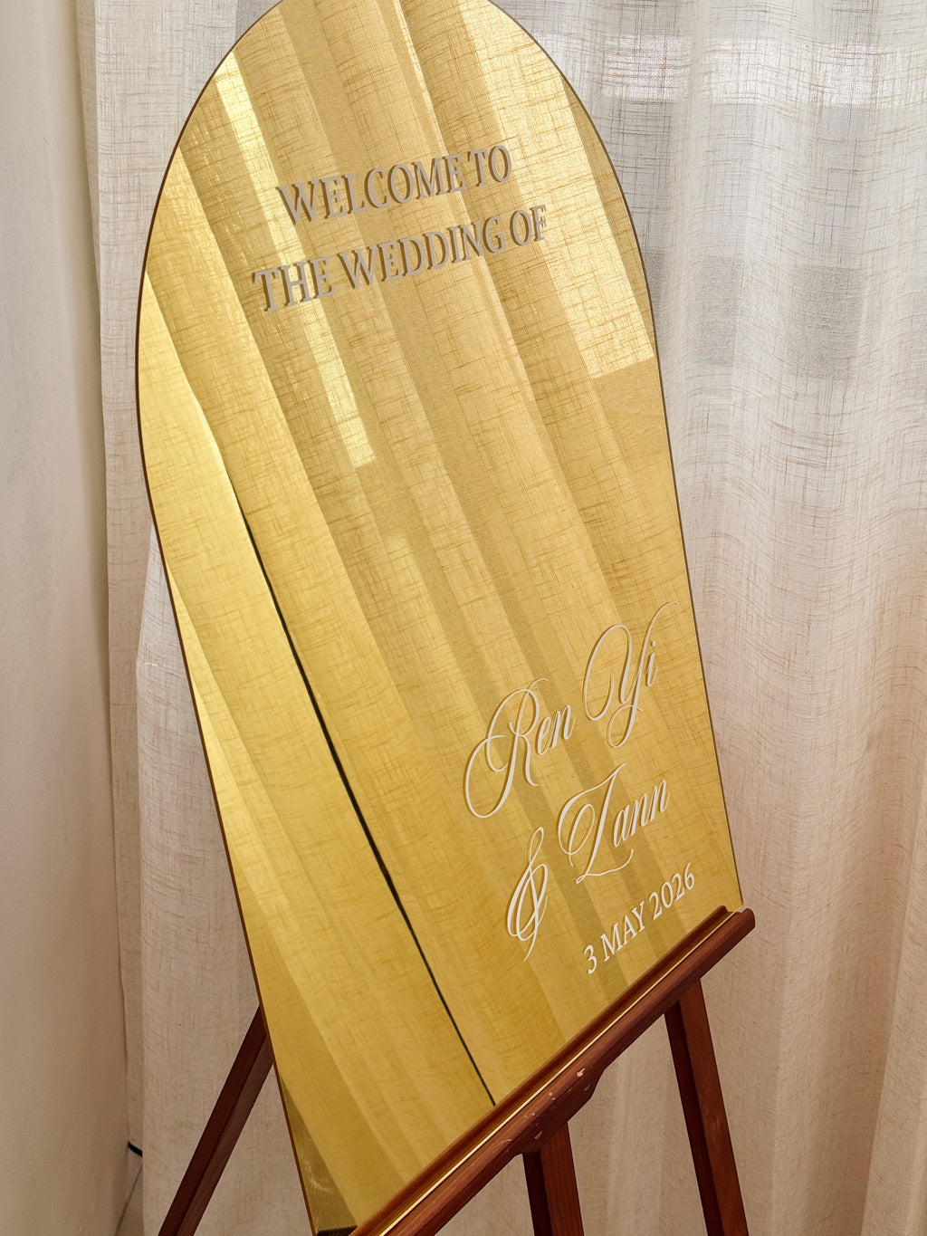 Customised elegant wedding and event gold mirror decor, as welcome sign with your names or seat assignment sign for your guests, rental by Eden's Ground.
