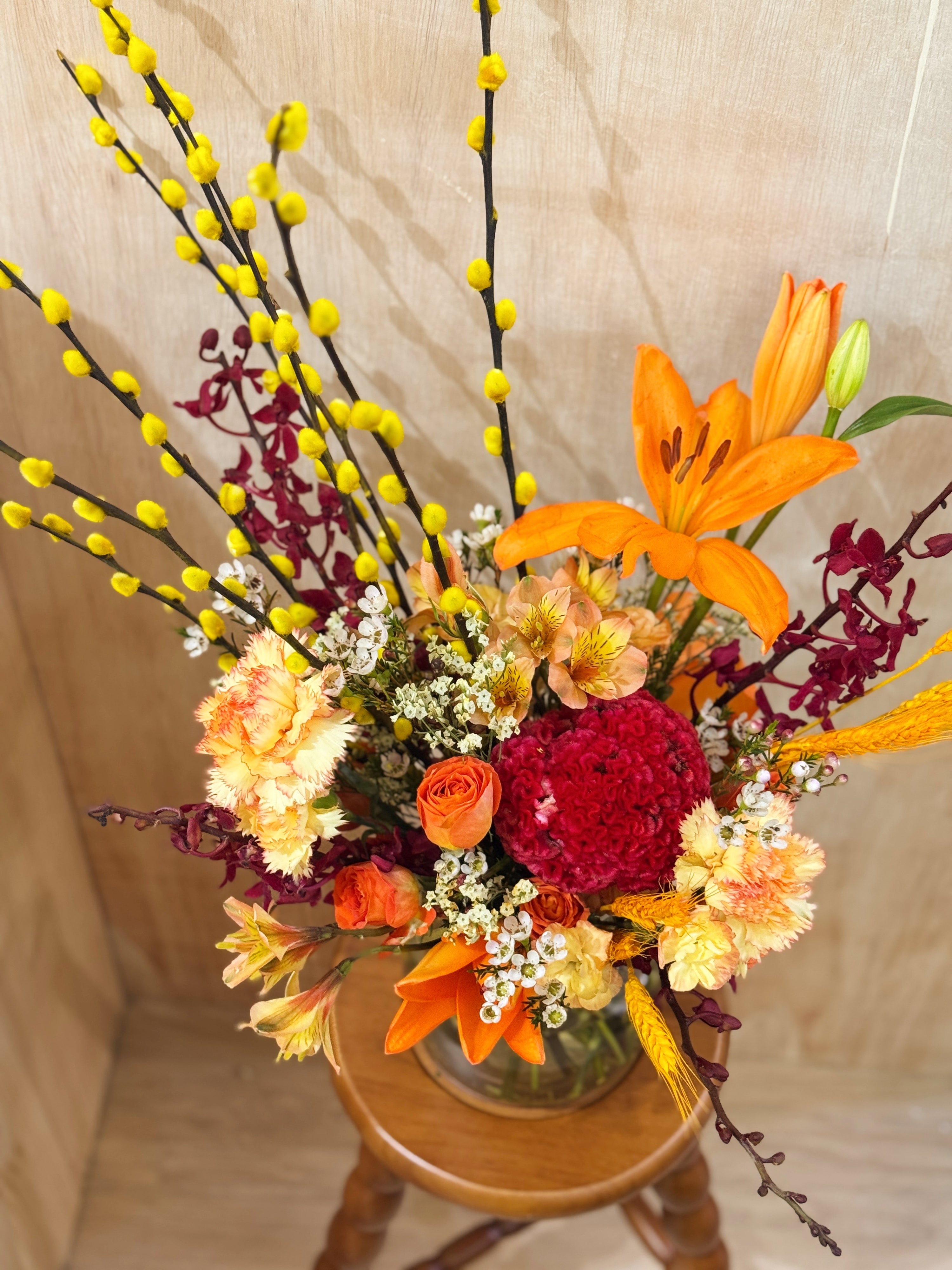 Chinese New Year 2026 Golden Pussy Willow Fresh Flower Vase Arrangement, CNY 2026 Flowers, featuring yellow golden pussy willow cny flower, Lilies with roses, carnations and more to usher in wealth, abundance, prosperity and all the good vibes for the lunar new year, crafted by Eden's Ground, a floral design studio in Singapore. Delivered straight to your doorstep.