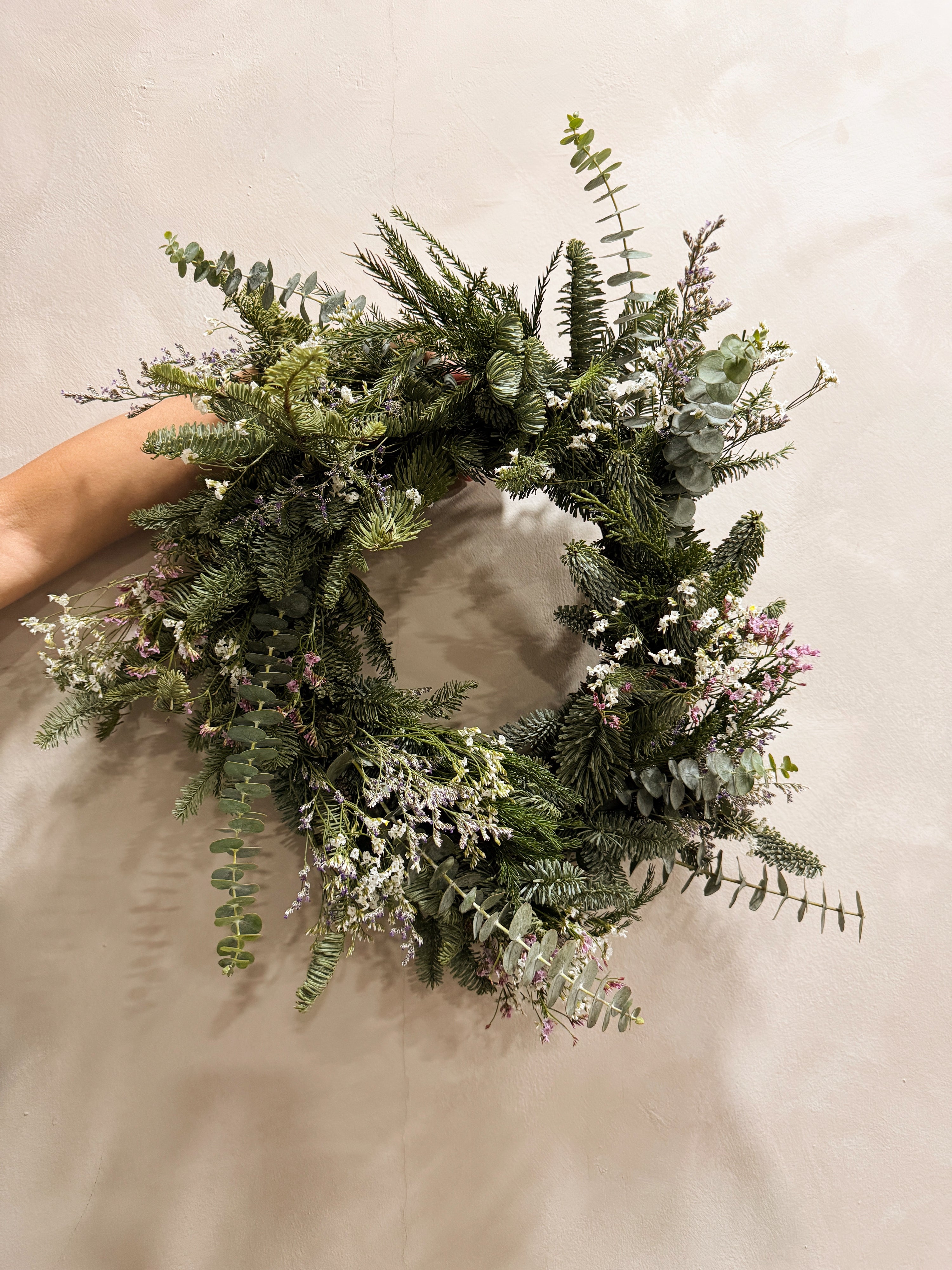 Christmas Wreath Workshop in Singapore. Create your own festive wreath using a variety of fresh firs, foliage and natural textures. Held at our cosy floral studio in Joo Chiat, it's the perfect hands-on holiday experience to get into the Christmas spirit.