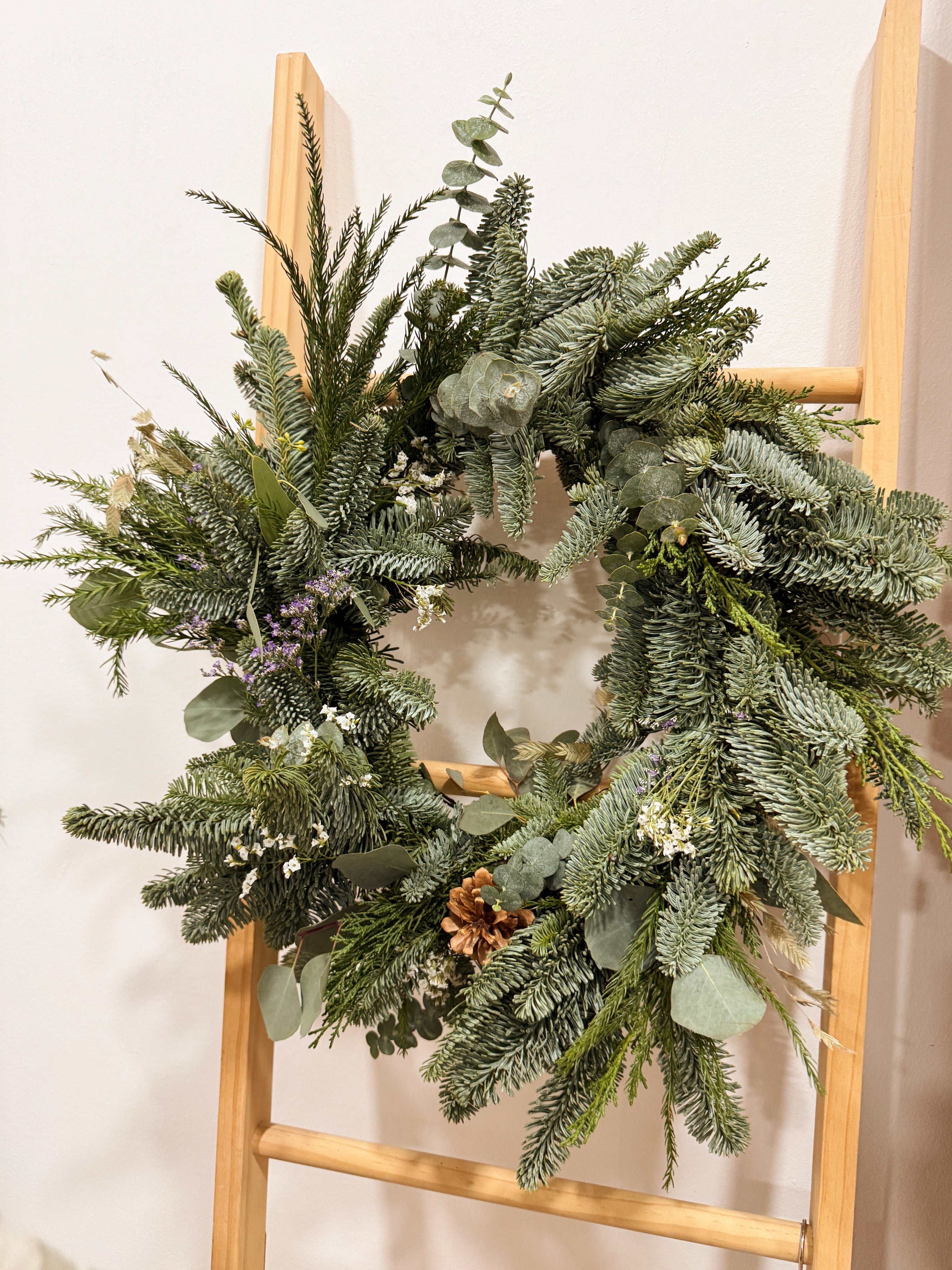 Christmas Wreath Workshop in Singapore. Create your own festive wreath using a variety of fresh firs, foliage and natural textures. Held at our cosy floral studio in Joo Chiat, it's the perfect hands-on holiday experience to get into the Christmas spirit.