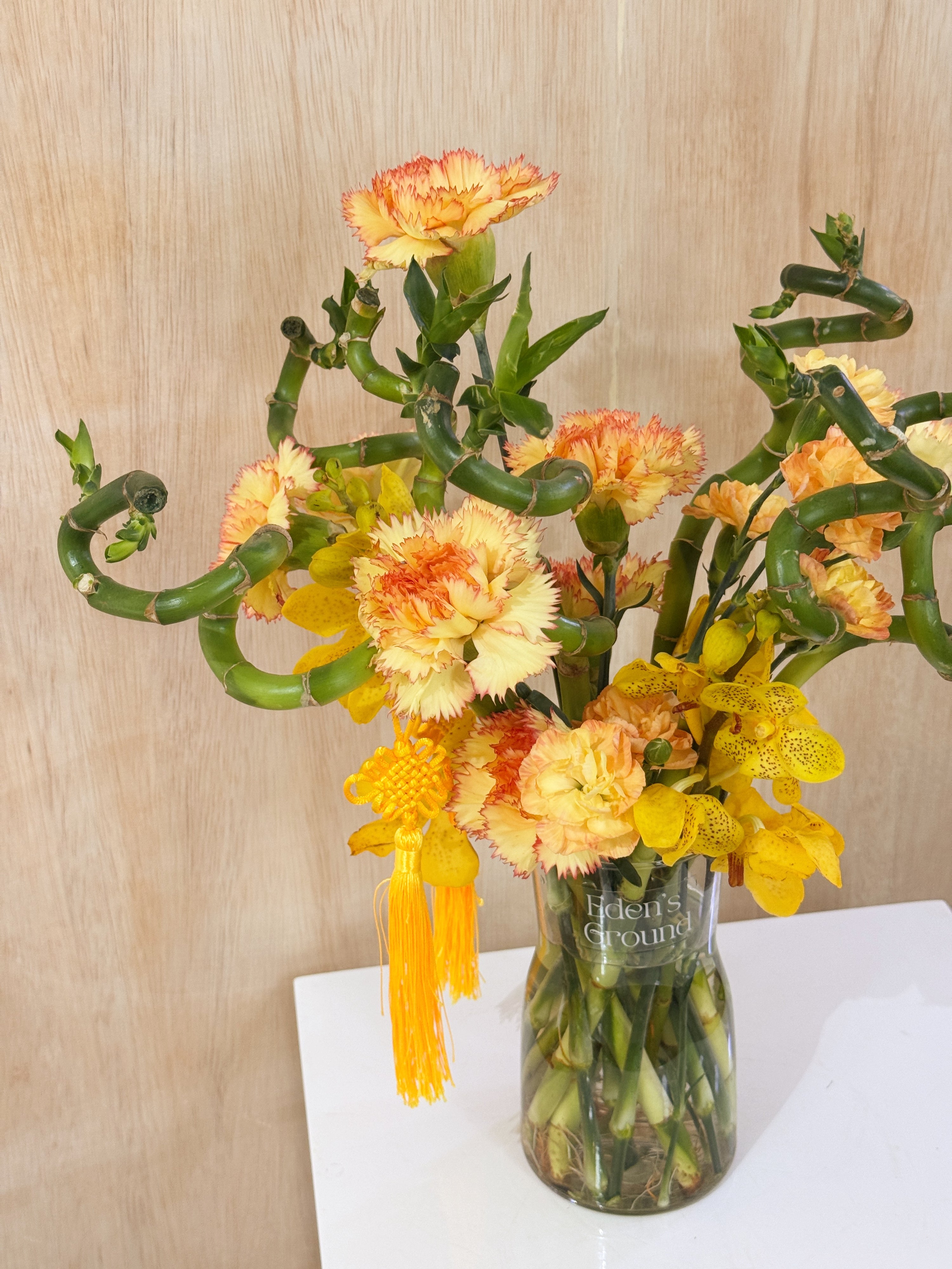 Chinese New Year 2026 Lucky Bamboo Fresh Flower Vase Arrangement, CNY 2026 Flowers, featuring auspicious 8 stalks of lucky bamboo with orchid cny flower, to usher in wealth, abundance, prosperity and all the good vibes for the lunar new year, crafted by Eden's Ground, a floral design studio in Singapore. Delivered straight to your doorstep.