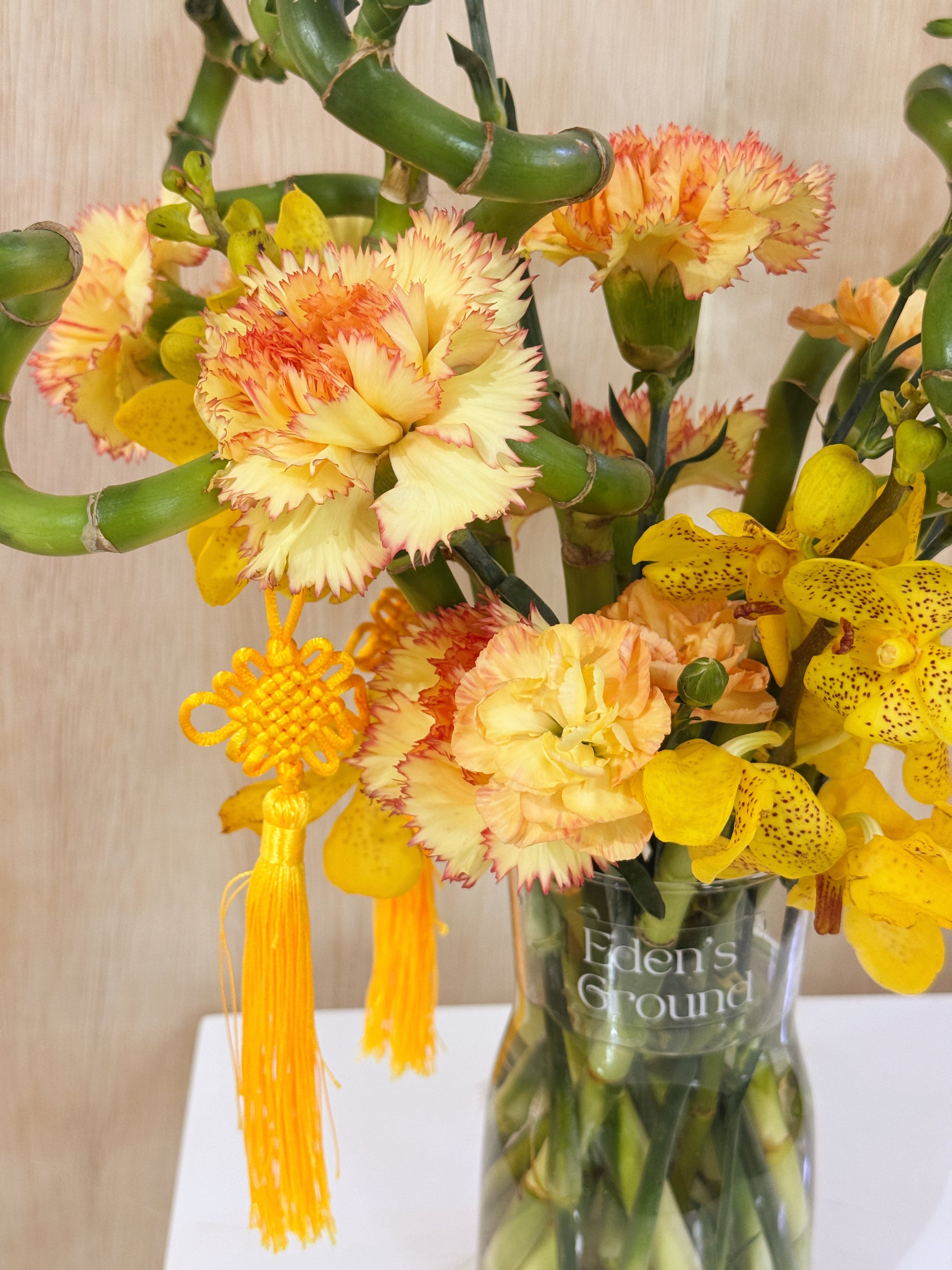 Chinese New Year 2026 Lucky Bamboo Fresh Flower Vase Arrangement, CNY 2026 Flowers, featuring auspicious 8 stalks of lucky bamboo with orchid cny flower, to usher in wealth, abundance, prosperity and all the good vibes for the lunar new year, crafted by Eden's Ground, a floral design studio in Singapore. Delivered straight to your doorstep.