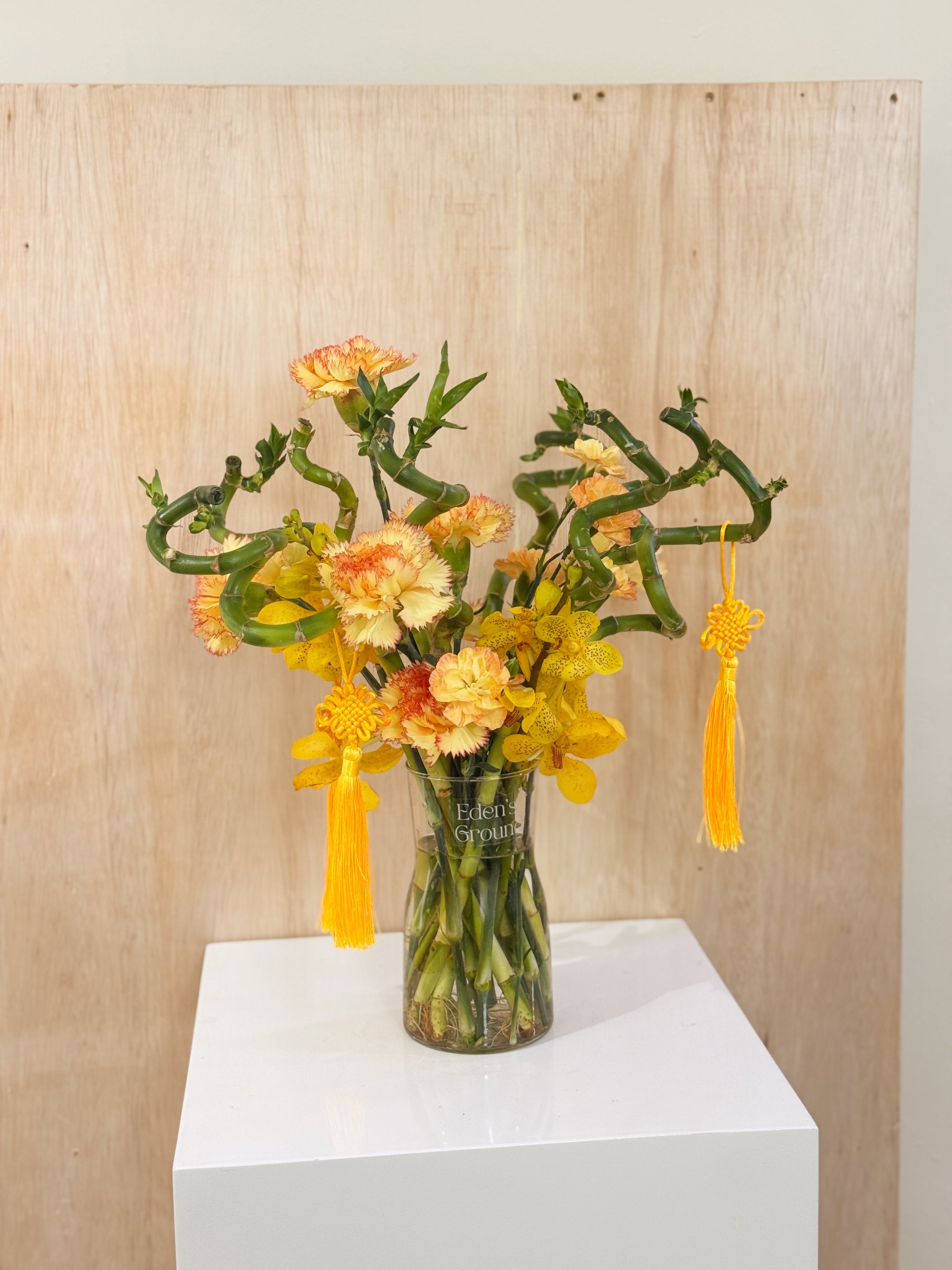 Chinese New Year 2026 Lucky Bamboo Fresh Flower Vase Arrangement, CNY 2026 Flowers, featuring auspicious 8 stalks of lucky bamboo with orchid cny flower, to usher in wealth, abundance, prosperity and all the good vibes for the lunar new year, crafted by Eden's Ground, a floral design studio in Singapore. Delivered straight to your doorstep.