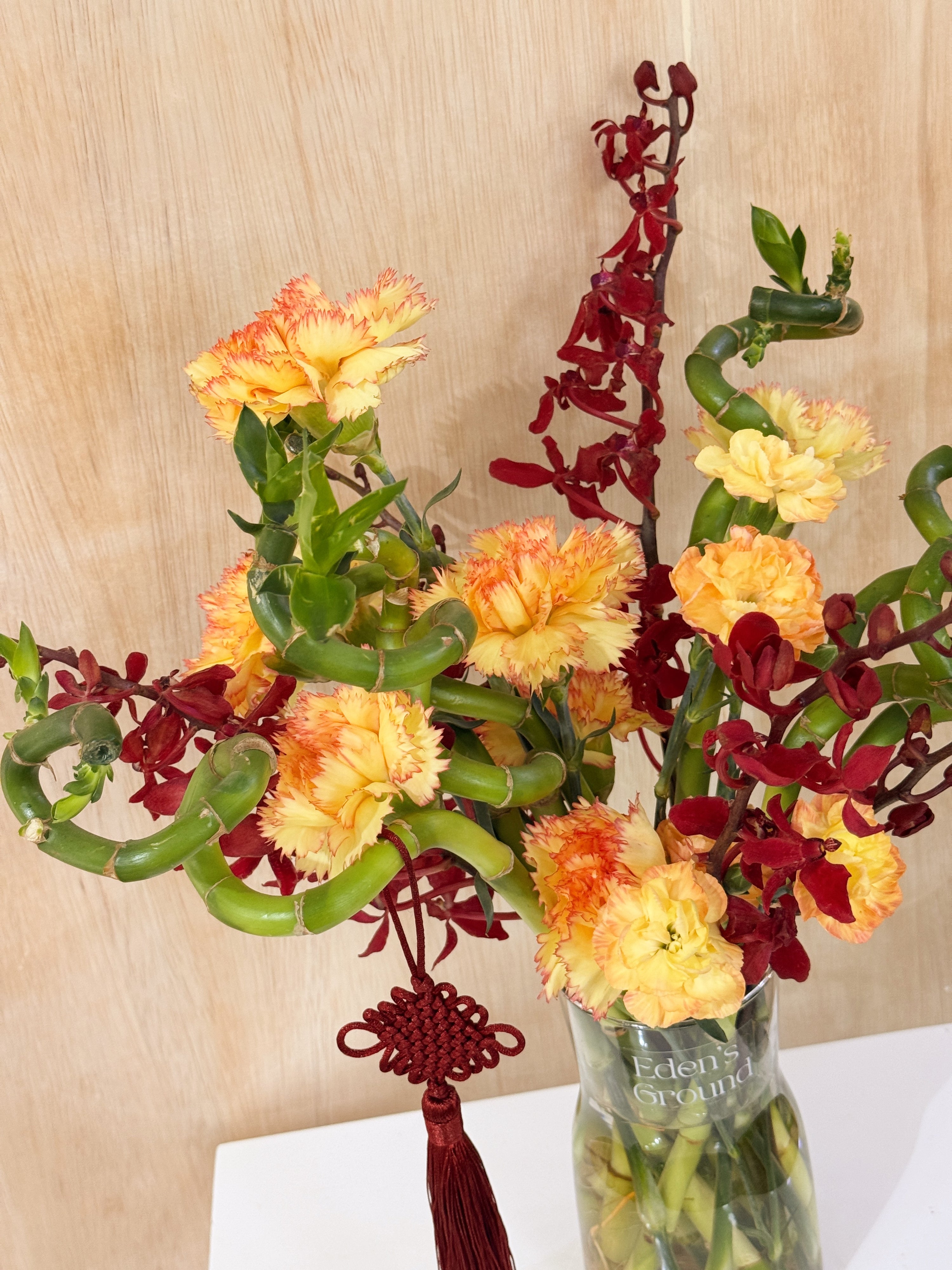 Chinese New Year 2026 Lucky Bamboo Fresh Flower Vase Arrangement, CNY 2026 Flowers, featuring auspicious 8 stalks of lucky bamboo with orchid cny flower, to usher in wealth, abundance, prosperity and all the good vibes for the lunar new year, crafted by Eden's Ground, a floral design studio in Singapore. Delivered straight to your doorstep.