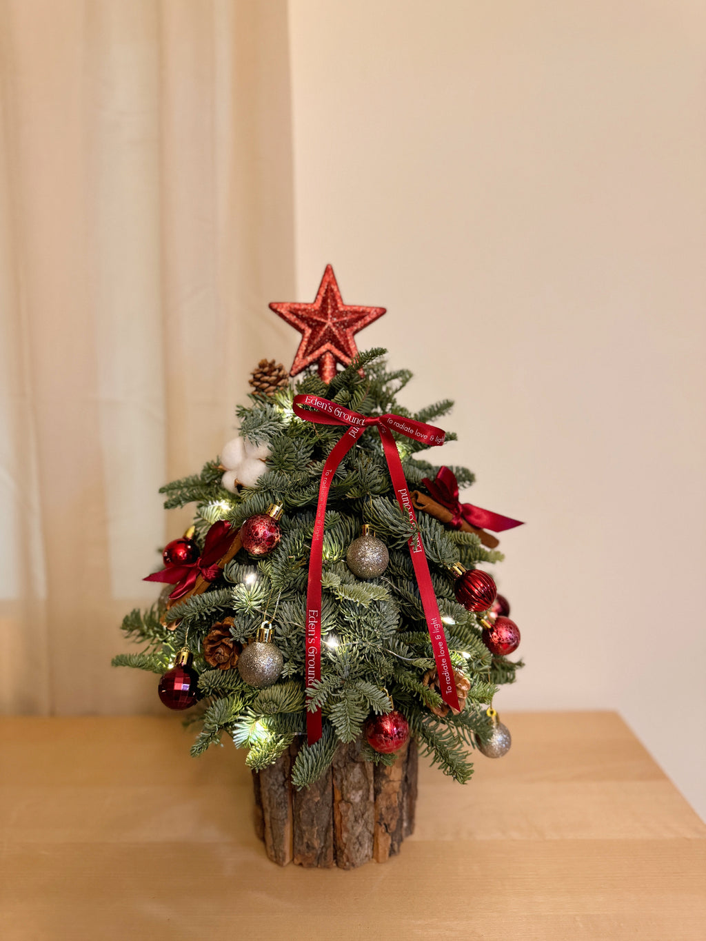 Fresh DIY Kit, Mini Tabletop Christmas Tree, decorated with baubles, ornaments, cotton, pinecones, cinnamon sticks and more by Eden's Ground, a Floral Design Studio in Singapore.
