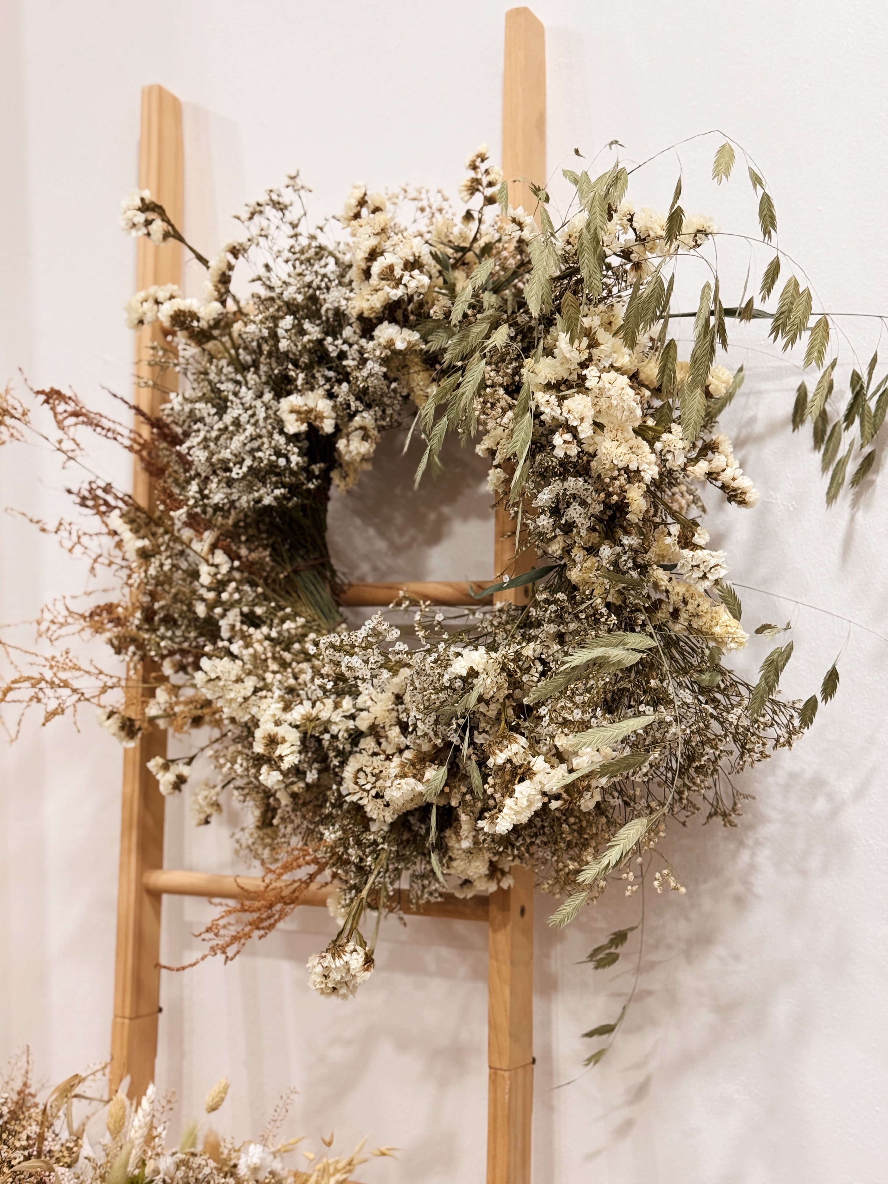 This hands-on floral wreath making workshop using dried flowers is guided by Eden's Ground, a floral design boutique. A sustainable activity using dried flowers. 