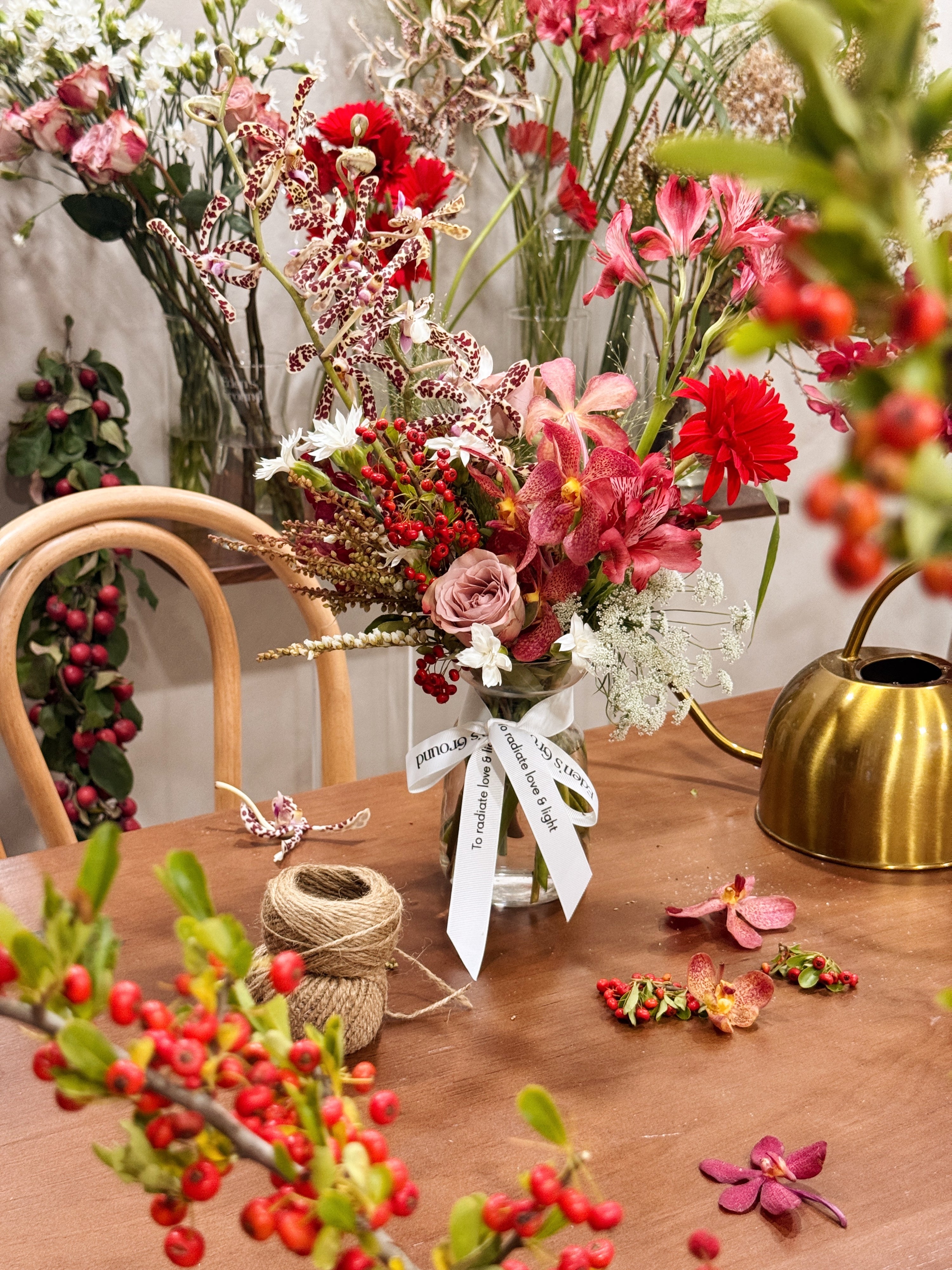 Petite clear glass vase, suitable for flower vase arrangements. Available at Eden's Ground, a floral design boutique.