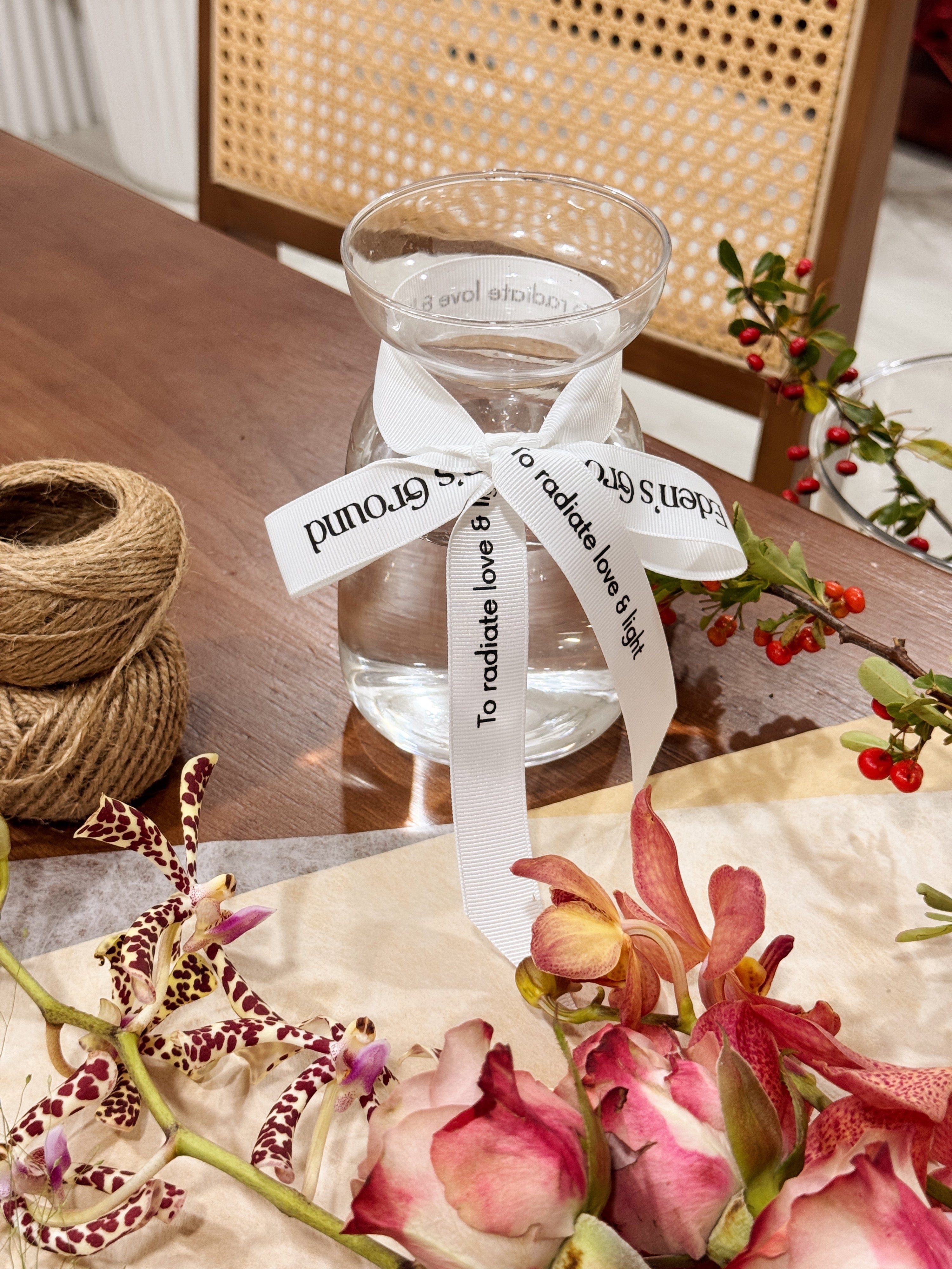 Petite clear glass vase, suitable for flower vase arrangements. Available at Eden's Ground, a floral design boutique.