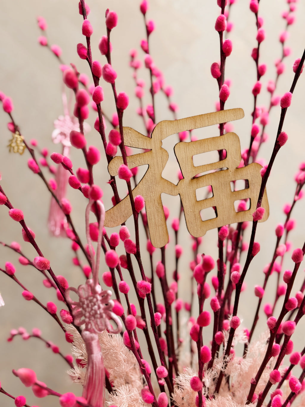 Chinese New Year 2026 Pussy Willow Flower Box, featuring pink and gold pussy willow cny flower, everlasting preserved hydrangeas, decorated with pink tassles and 福 to usher in wealth, abundance, prosperity and all the good vibes for the lunar new year, crafted by Eden's Ground, a floral design studio in Singapore. Delivered straight to your doorstep.