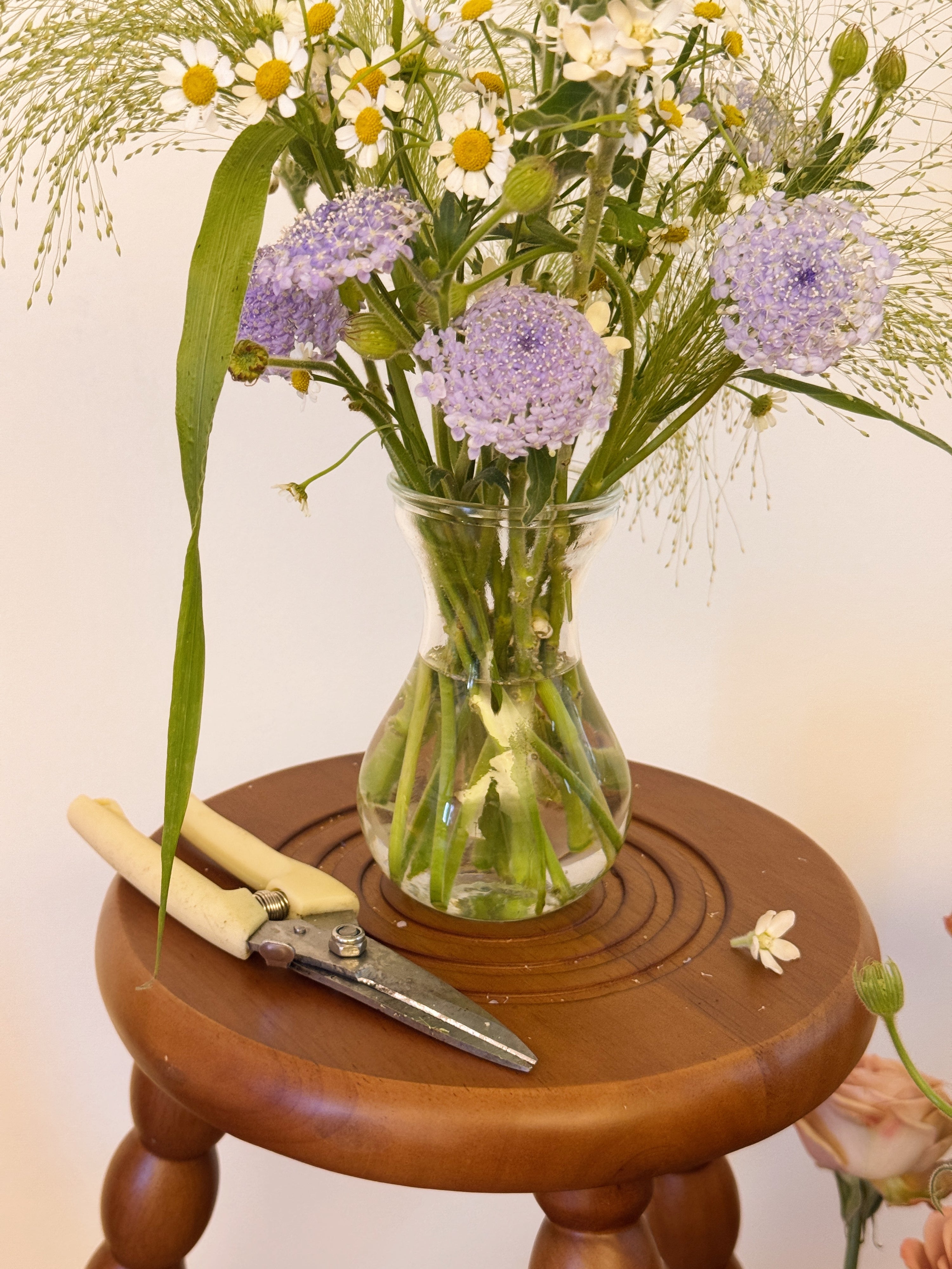 Clear glass vase, suitable for flower vase arrangements. Available at Eden's Ground, a floral design boutique.