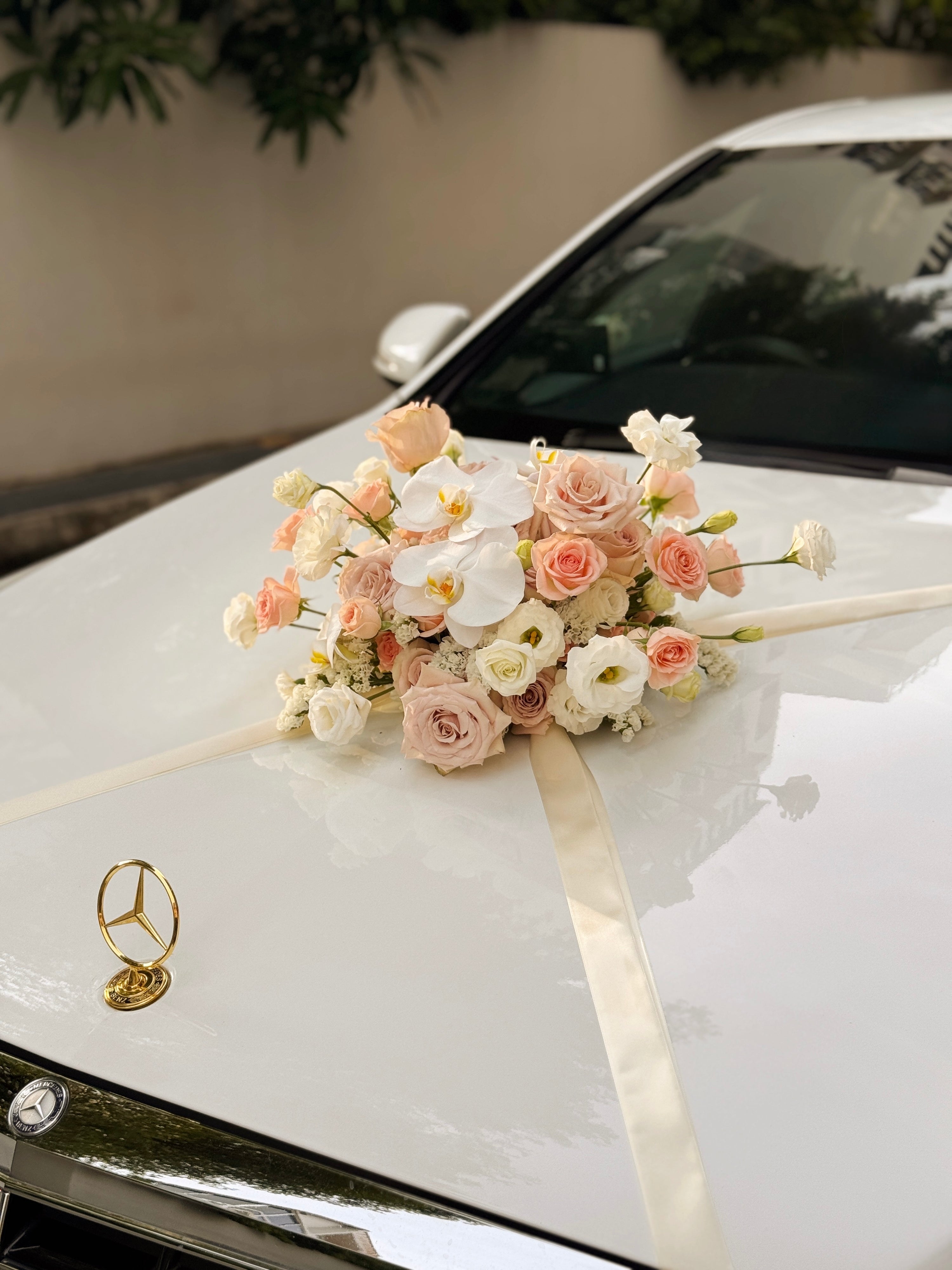 Wedding bridal car decor, craffted with fresh flowers by Eden's Ground, a floral design boutique.