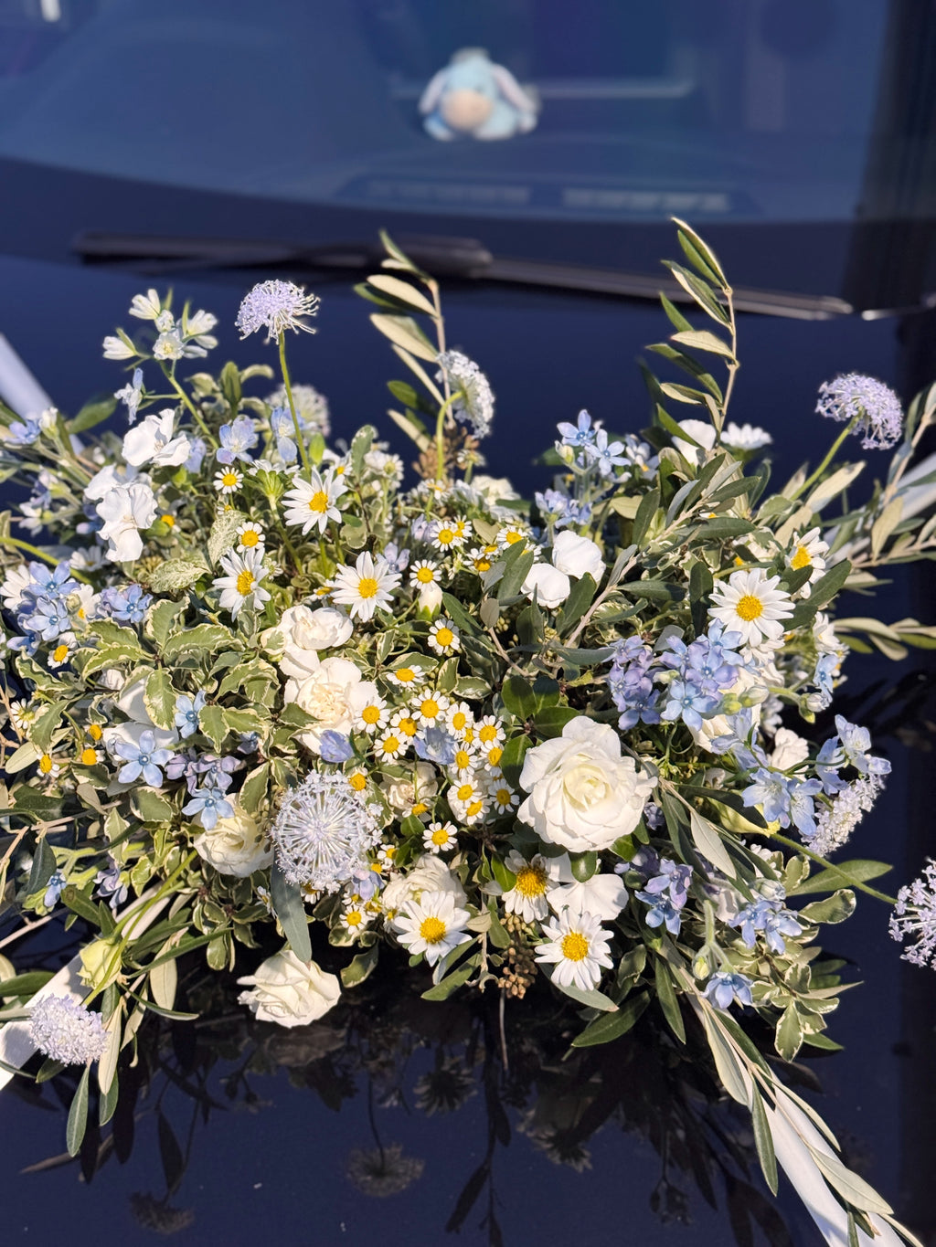 Wedding bridal car decor, craffted with fresh flowers by Eden's Ground, a floral design boutique.