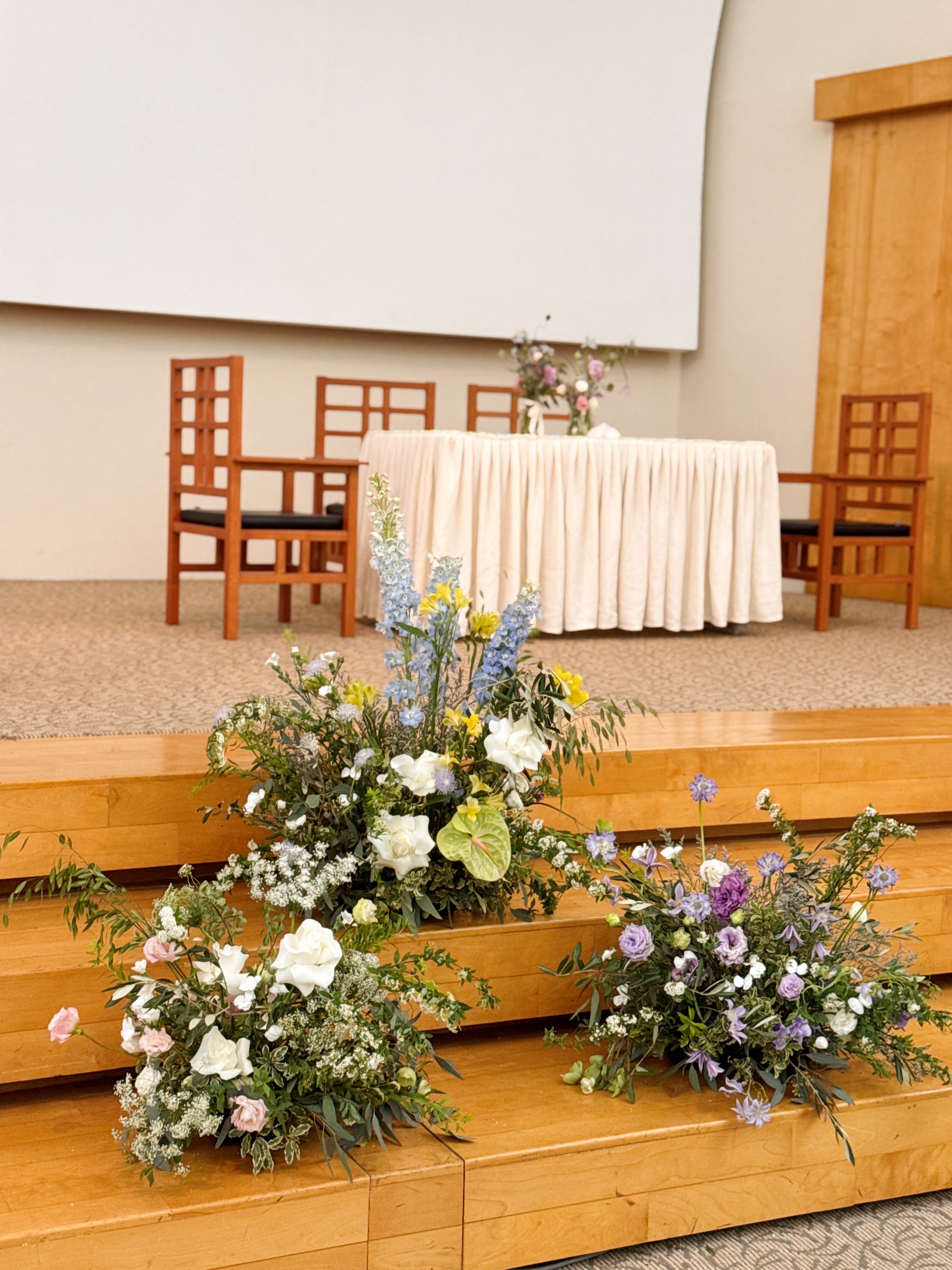 Ground floral hedges or set up on a pedestal, made thoughtfully to complement your wedding theme with carefully selected blooms — to adorn your venue as you walk down the aisle, create an Instagram-worthy photo wall and backdrop, or elegantly define spaces at your wedding. Made by Eden's Ground, a floral design boutique in Singapore.