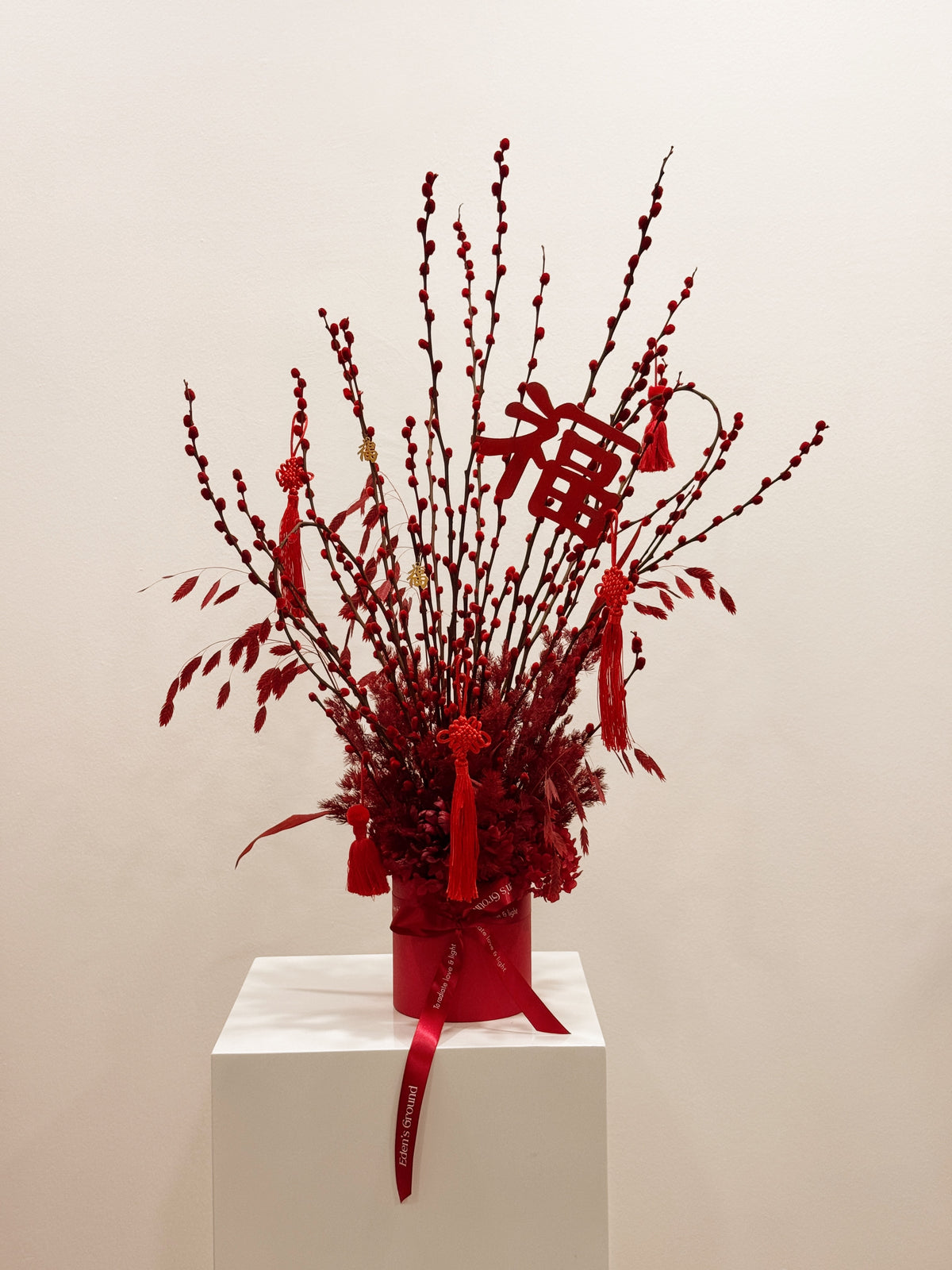 Chinese New Year 2026 Pussy Willow Flower Box, CNY 2026 Flowers, featuring red pussy willow cny flower, everlasting preserved hydrangeas, decorated with red tassles and 福 to usher in wealth, abundance, prosperity and all the good vibes for the lunar new year, crafted by Eden's Ground, a floral design studio in Singapore. Delivered straight to your doorstep.