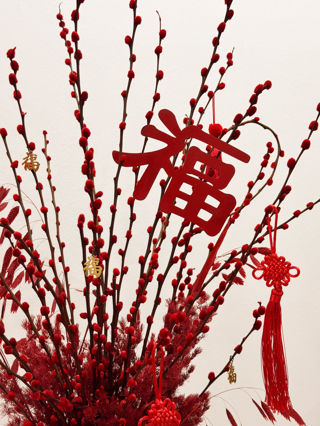 Chinese New Year 2026 Pussy Willow Flower Box, CNY 2026 Flowers, featuring red pussy willow cny flower, everlasting preserved hydrangeas, decorated with red tassles and 福 to usher in wealth, abundance, prosperity and all the good vibes for the lunar new year, crafted by Eden's Ground, a floral design studio in Singapore. Delivered straight to your doorstep.