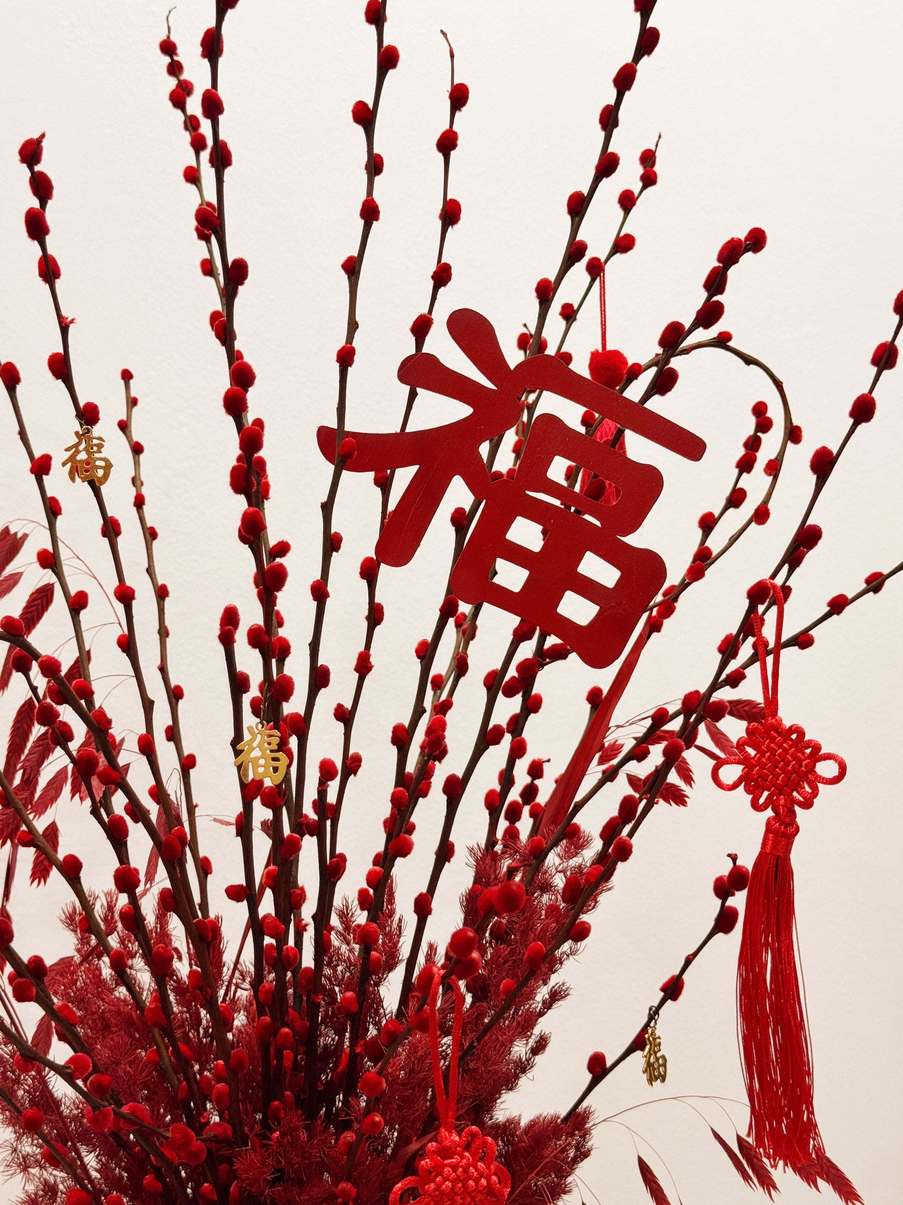 Chinese New Year 2026 Pussy Willow Flower Box, featuring red pussy willow cny flower, everlasting preserved hydrangeas, decorated with red tassles and 福 to usher in wealth, abundance, prosperity and all the good vibes for the lunar new year, crafted by Eden's Ground, a floral design studio in Singapore.