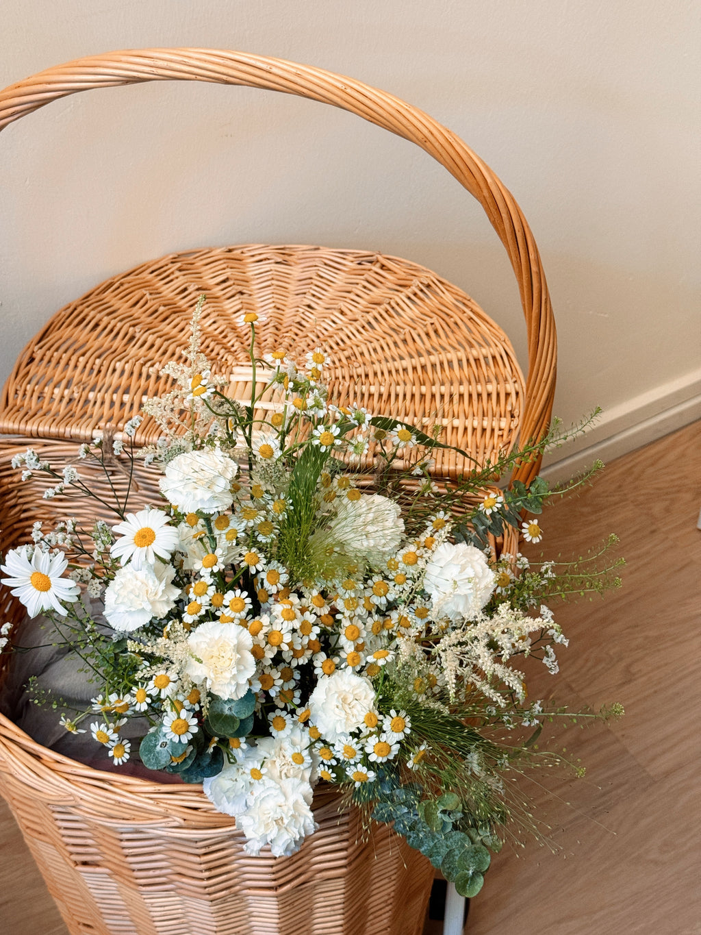 whimsical garden style bouquet crafted by Eden's Ground, a floral design studio in Singapore.
