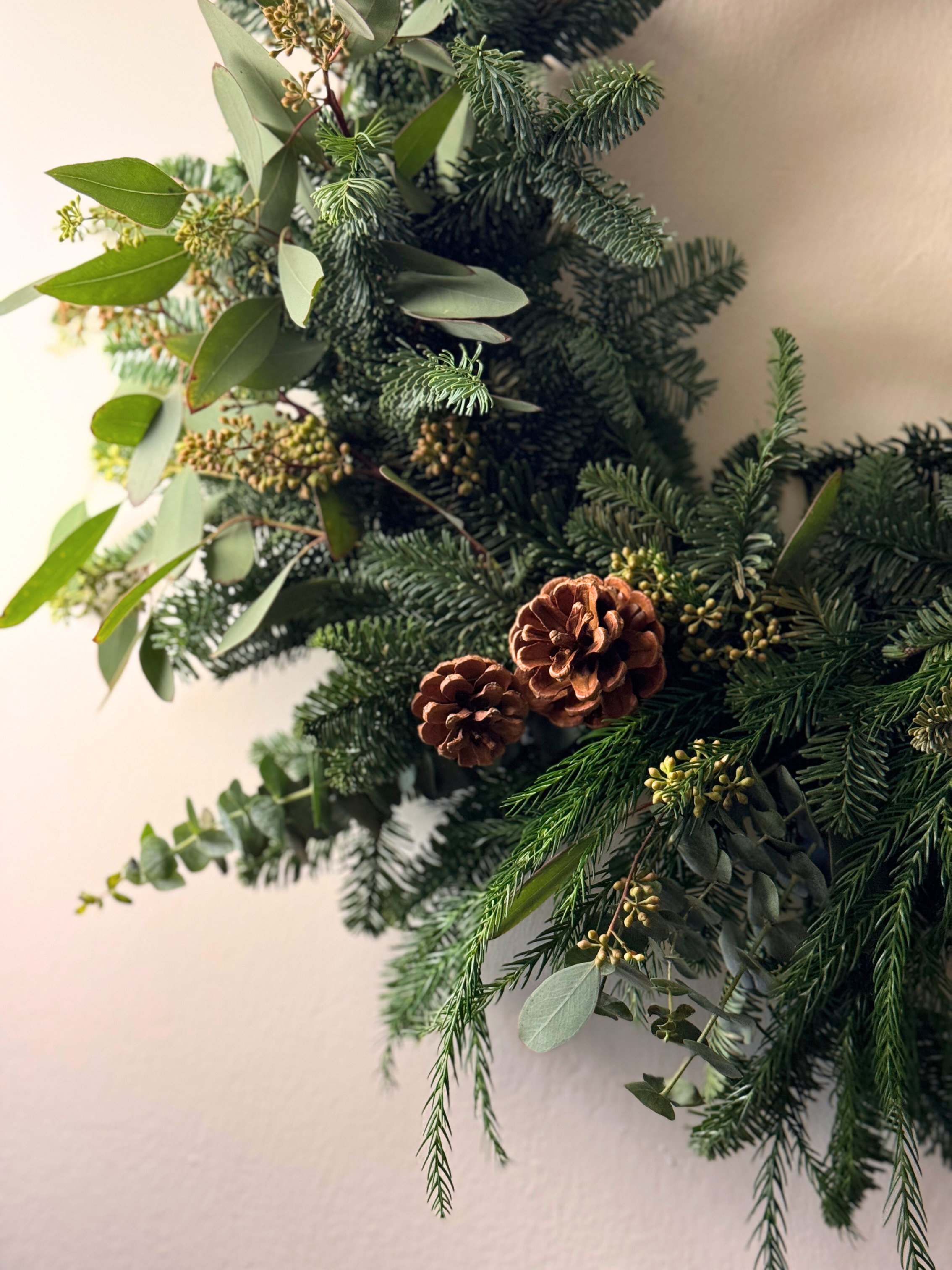 Christmas Wreath Workshop in Singapore. Create your own festive wreath using a variety of fresh firs, foliage and natural textures. Held at our cosy floral studio in Joo Chiat, it's the perfect hands-on holiday experience to get into the Christmas spirit.
